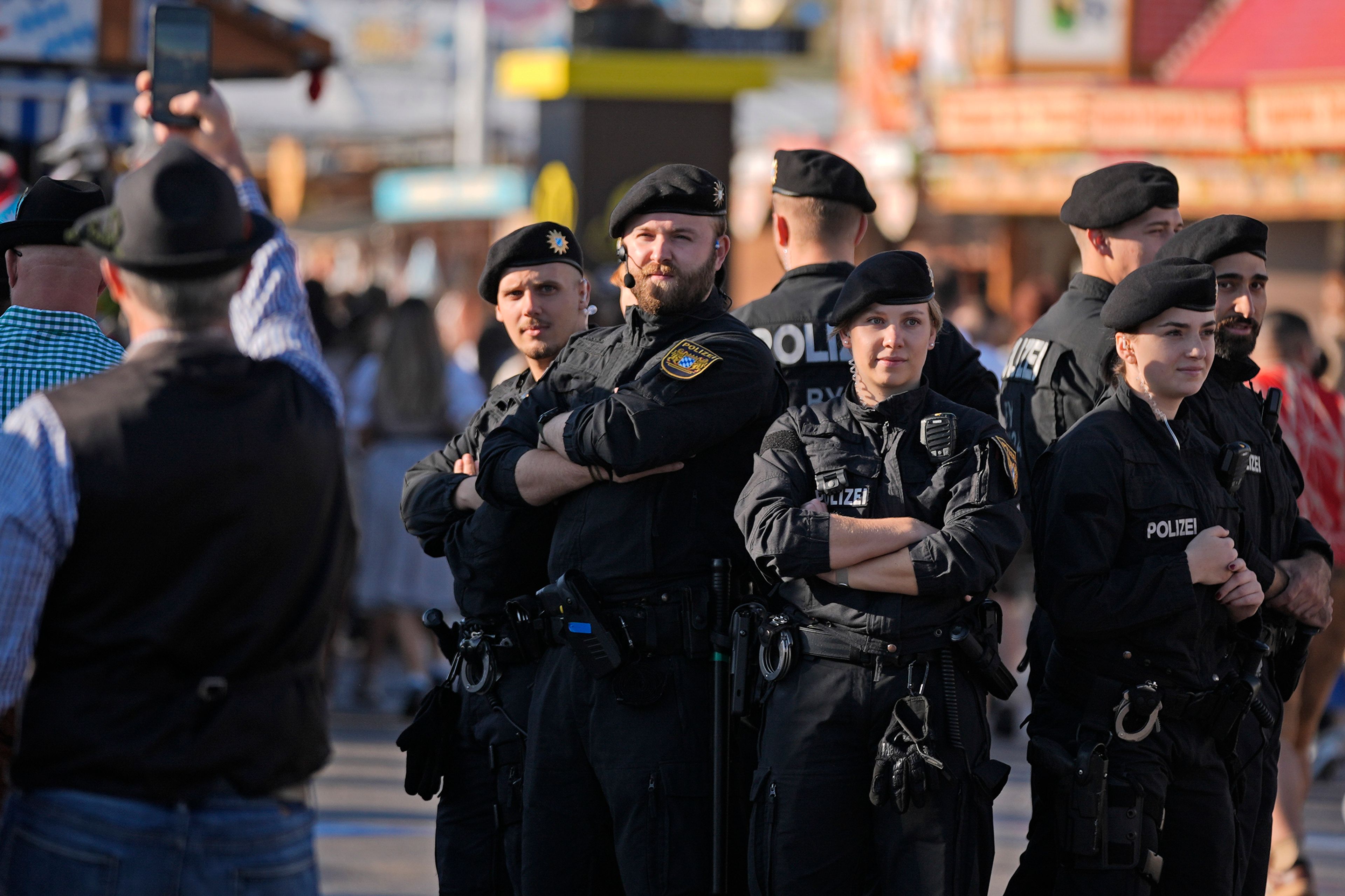 Police secures the start of the 189th 'Oktoberfest' beer festival in Munich, Germany, Saturday, Sept. 21, 2024. (AP Photo/Matthias Schrader),