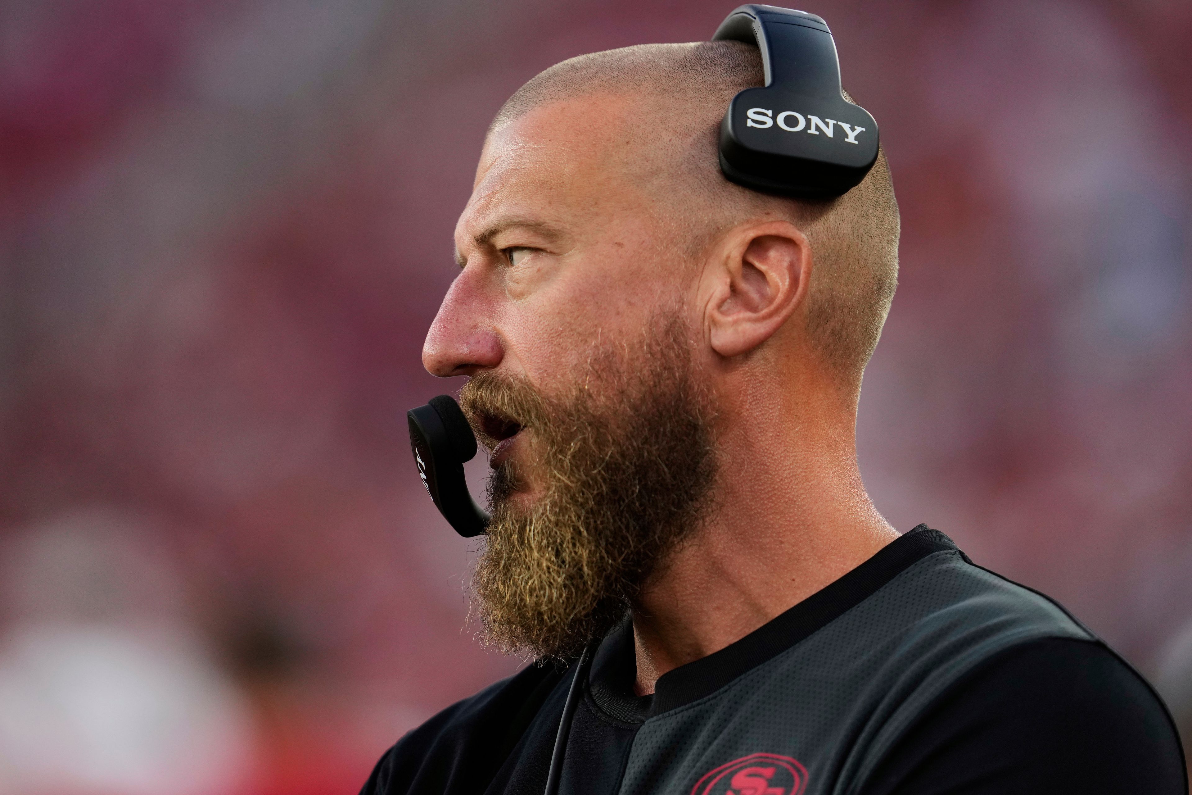 The 49ers run game coordinator/tight ends coach Brian Fleury, now offensive coordinator for the Seahawks, watches from the sideline during an NFL preseason game against the Chargers on Aug. 23, 2025, in Santa Clara, Calif.