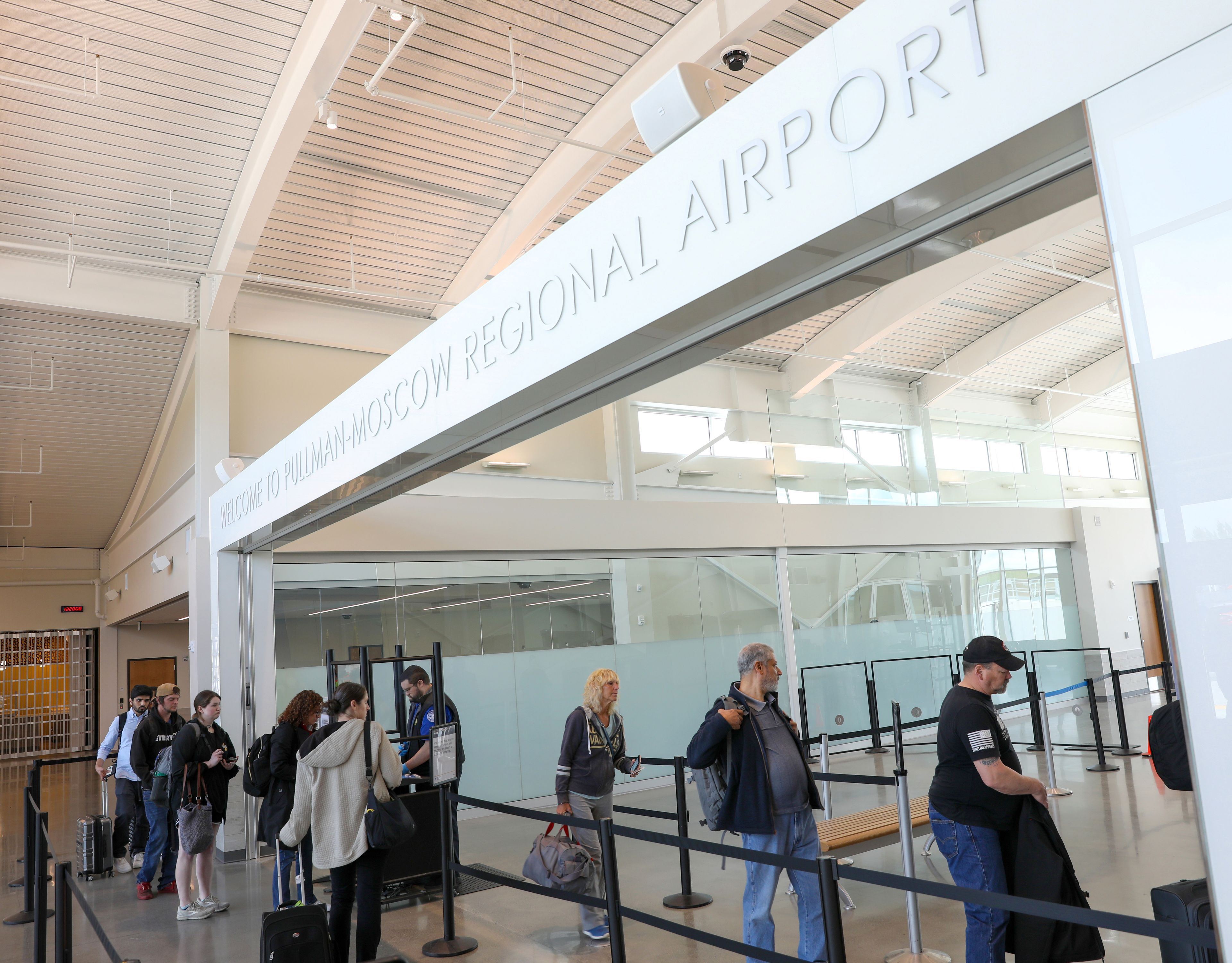 Passengers make their way toward TSA security at the center of the new Pullman-Moscow Regional Airport terminal in Pullman on Wednesday.