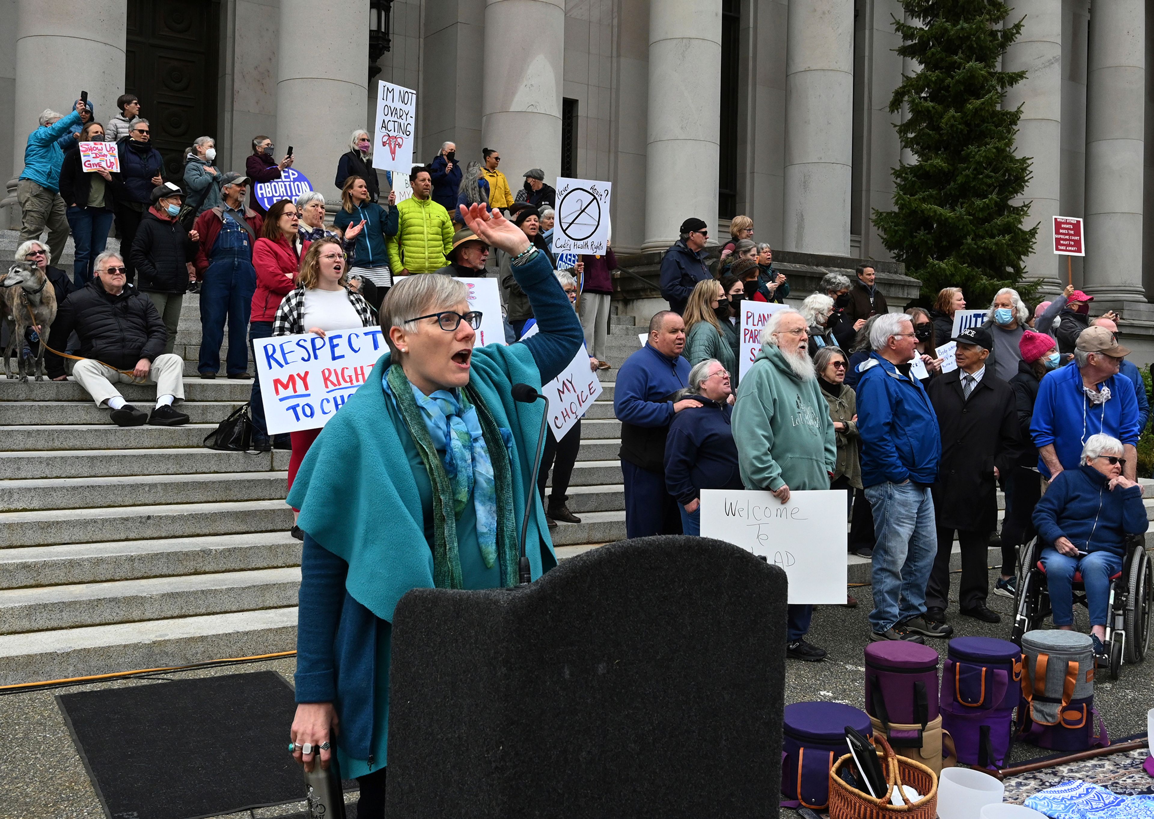 Rally co-organizer Barb Chamberlain addresses several hundred pro-choice supporters gathered on the steps of the Temple of Justice in Olympia, Wa., Tuesday, May 3, 2022, in response to the news that the U.S. Supreme Court could be poised to overturn the landmark Roe v. Wade case that legalized abortion nationwide. (Steve Bloom/The Olympian via AP)