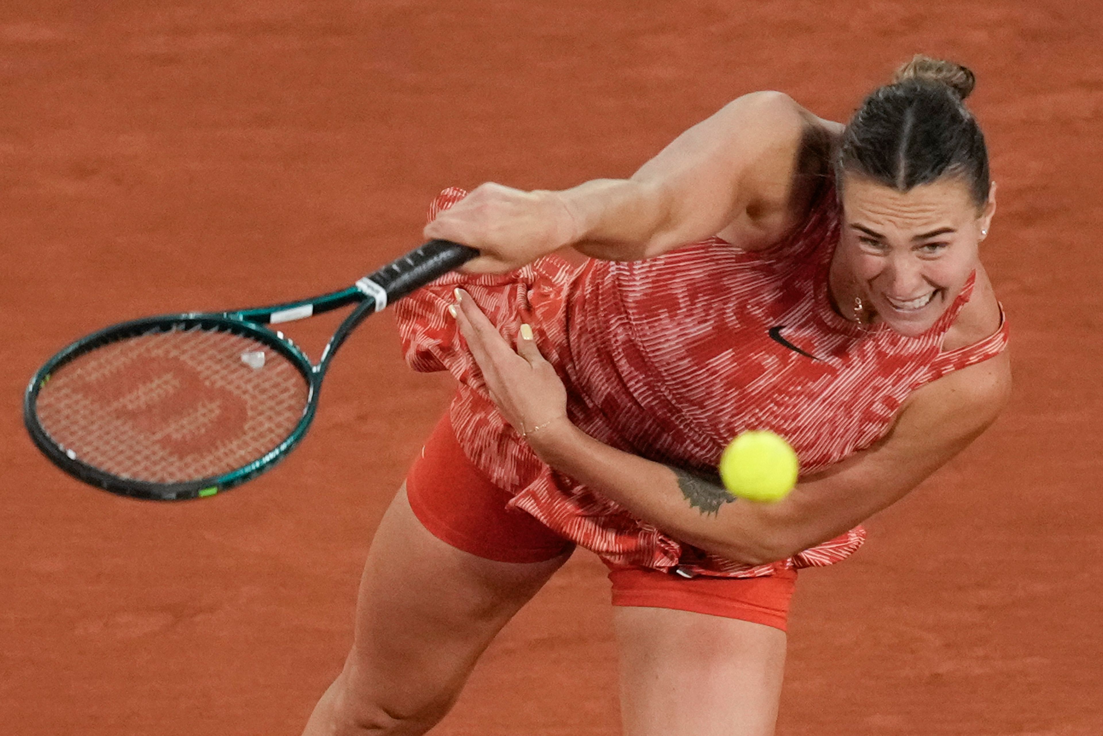 Aryna Sabalenka of Belarus serves against Spain's Paula Badosa during their third round match of the French Open tennis tournament at the Roland Garros stadium in Paris, Saturday, June 1, 2024.