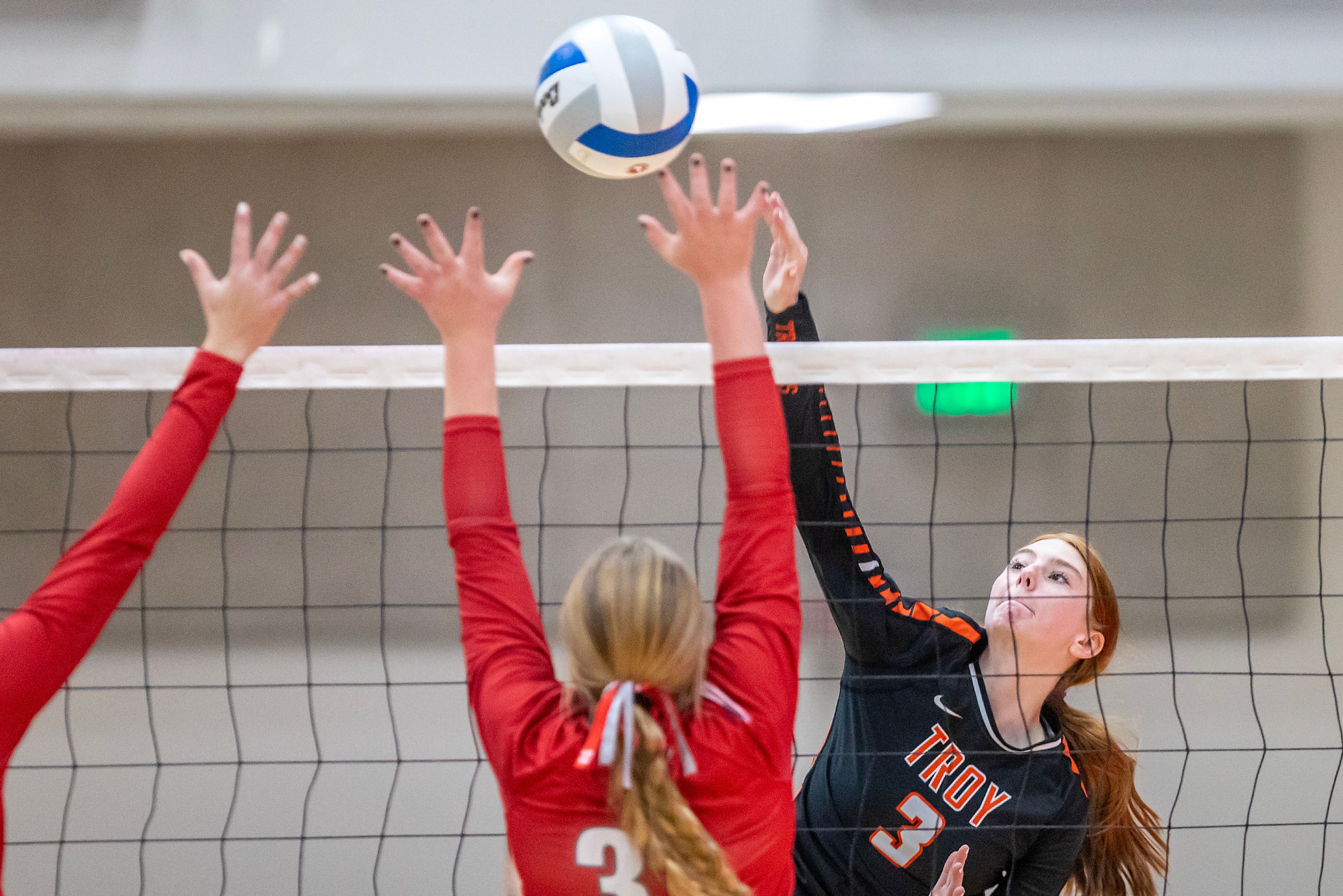 Troy senior outside hitter Dericka Morgan hits the ball over Grace at the Idaho 1A DI volleyball state championship match Oct. 28 at the P1FCU Activity Center in Lewiston.