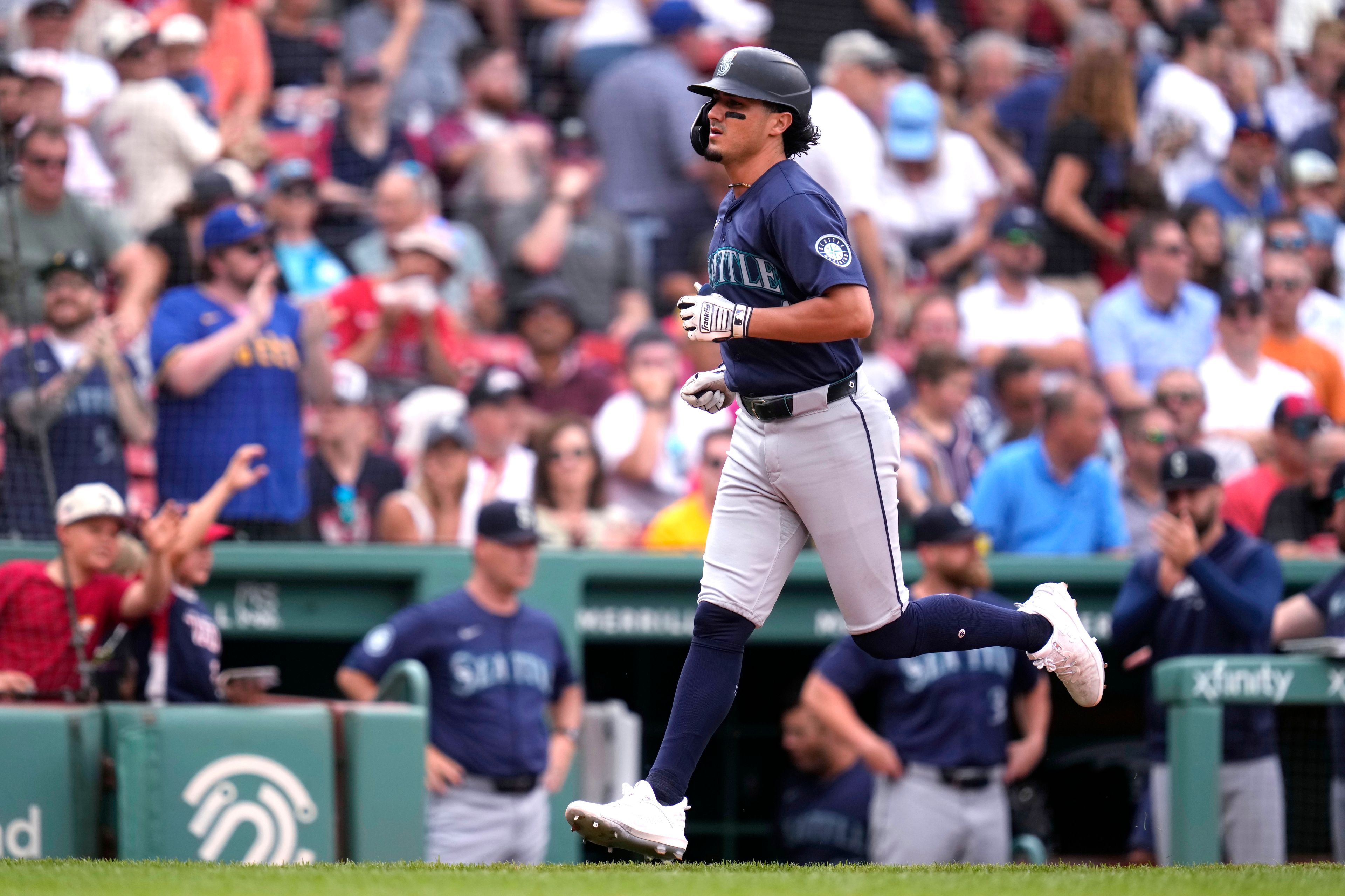 Seattle Mariners' Josh Rojas rounds the bases on his solo home run during the fifth inning of a baseball game against the Boston Red Sox, Wednesday, July 31, 2024, in Boston. (AP Photo/Charles Krupa)