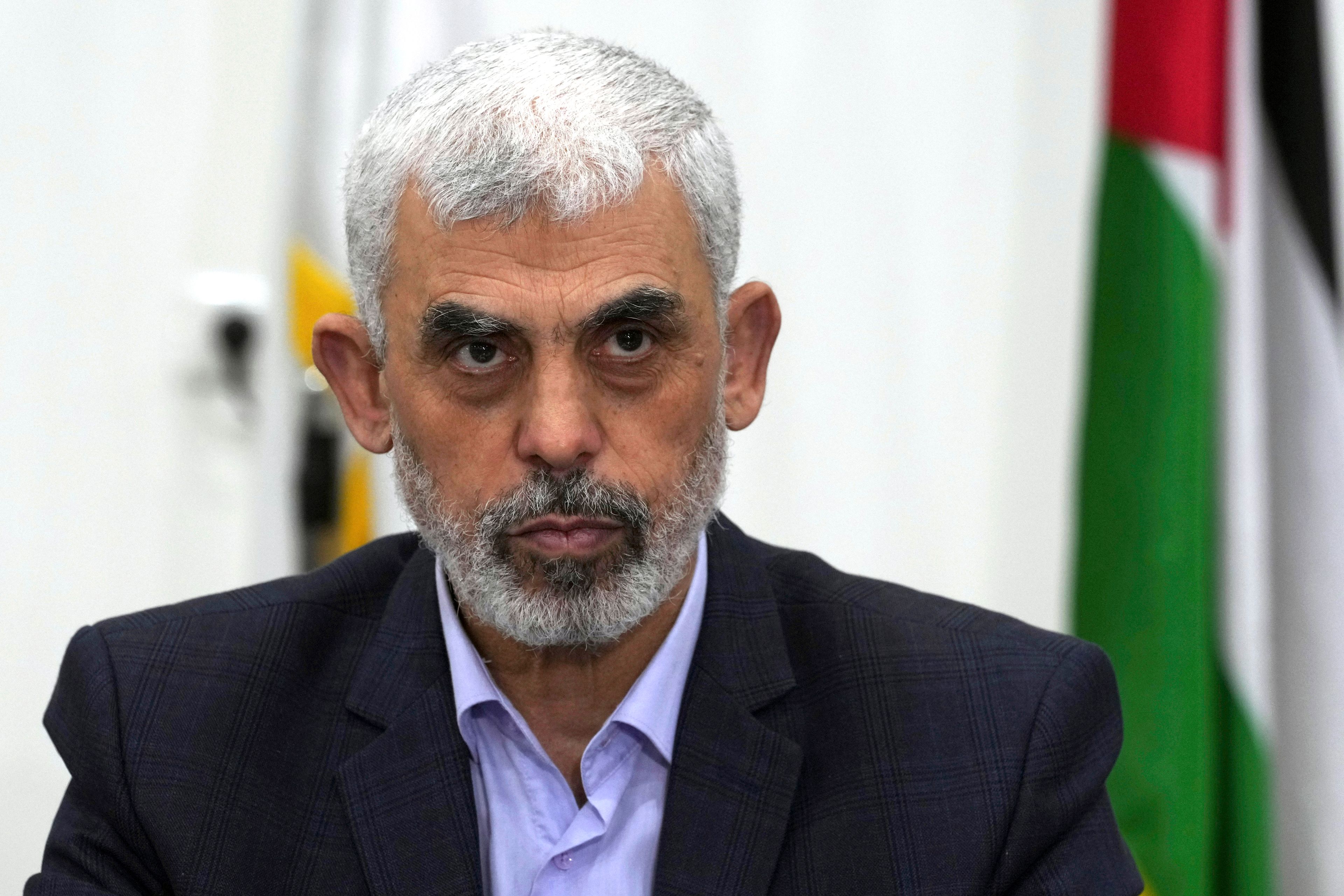 FILE - Yahya Sinwar, head of Hamas in Gaza, chairs a meeting with leaders of Palestinian factions at his office in Gaza City, on April 13, 2022. (AP Photo/Adel Hana, File)