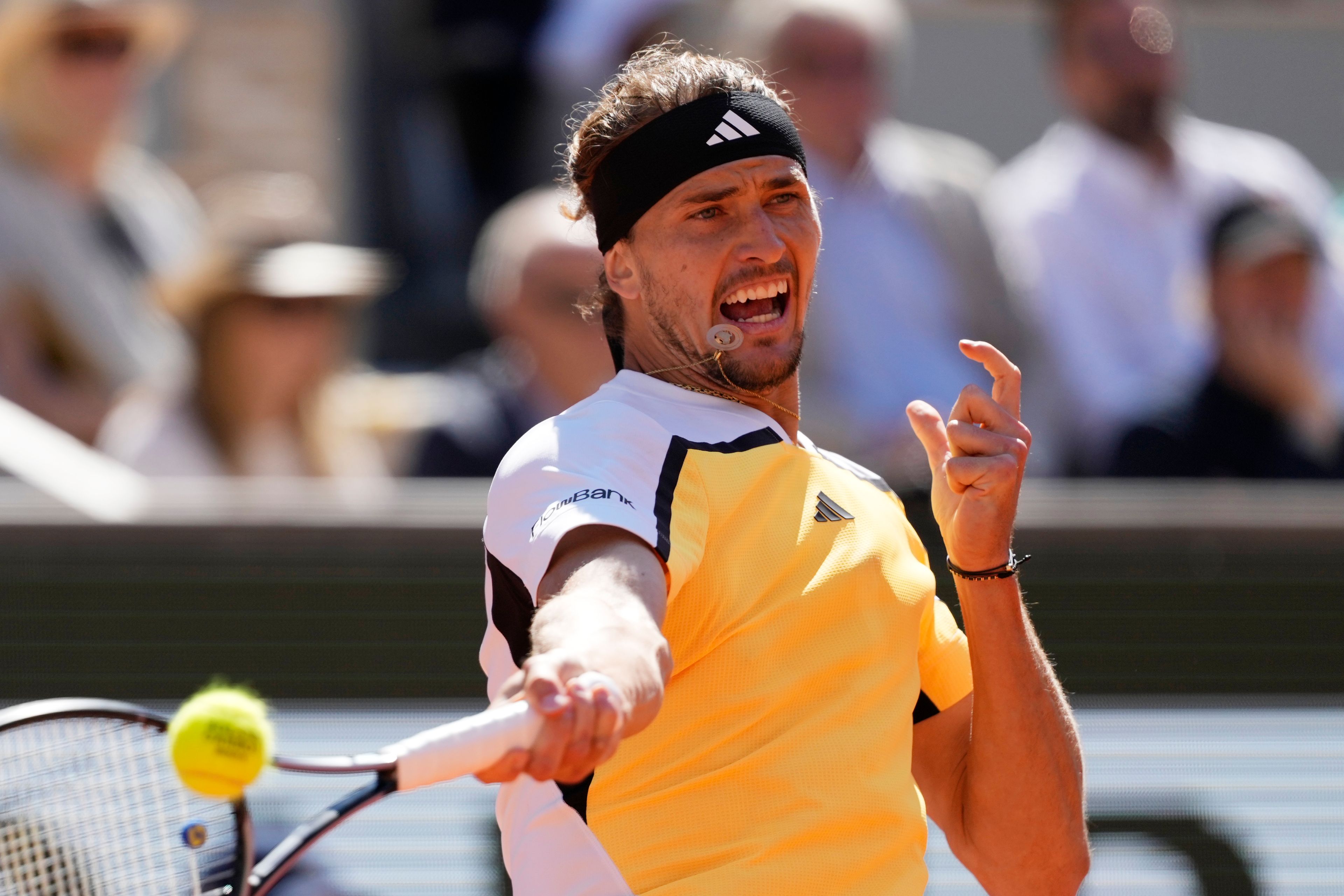 Germany's Alexander Zverev plays a shot against Spain's Carlos Alcaraz during the men's final match of the French Open tennis tournament at the Roland Garros stadium in Paris, Sunday, June 9, 2024.