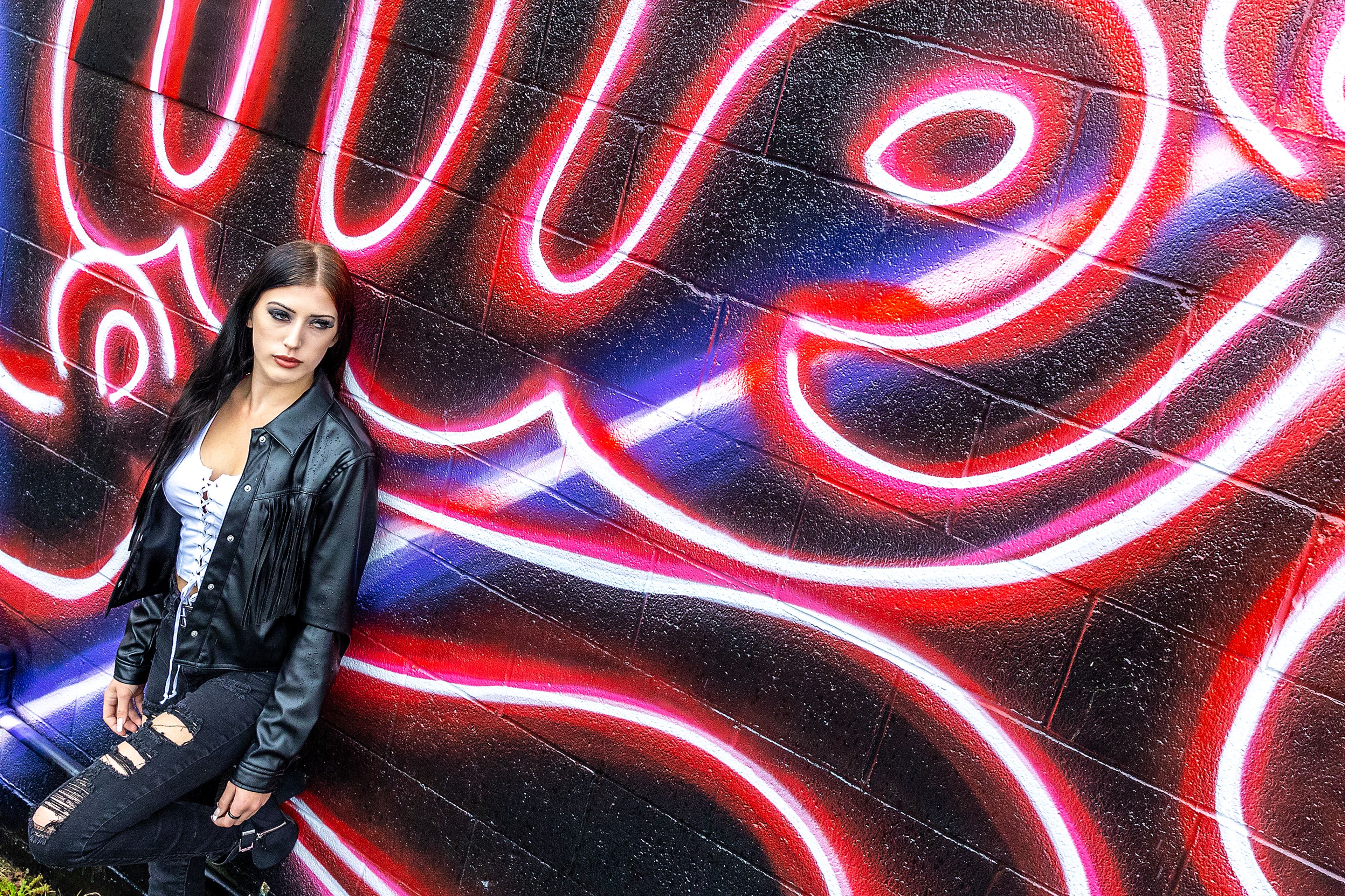 Sable Walburn poses for a photo wearing 90s era inspired makeup by Jacey Johnson Thursday, Sept. 12, in Lewiston.,