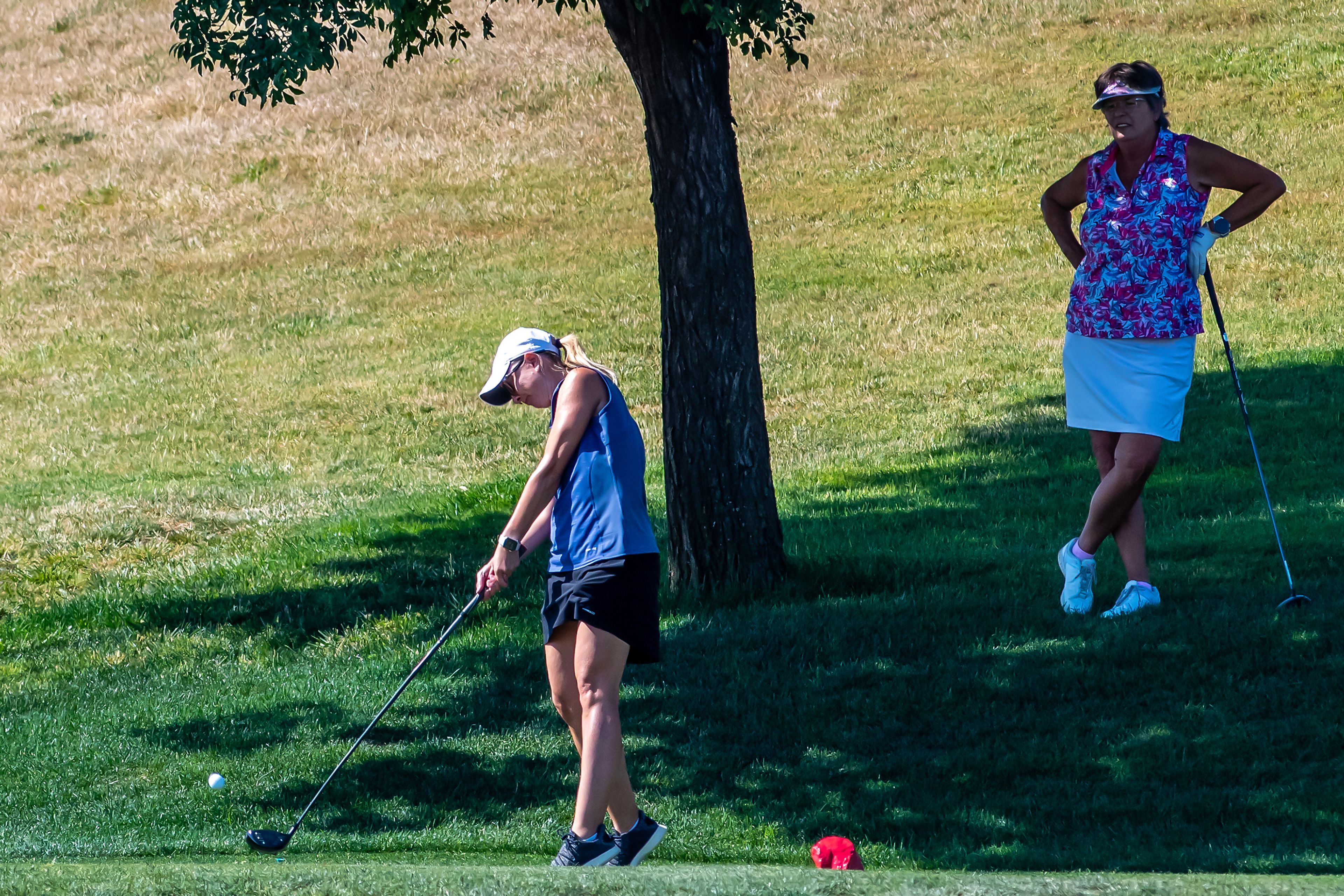 Jessica Shawley, with Quail Ridge, hits her ball during the Tribune Cup golf tournament at Quail Ridge Golf Course on Tuesday in Clarkston.