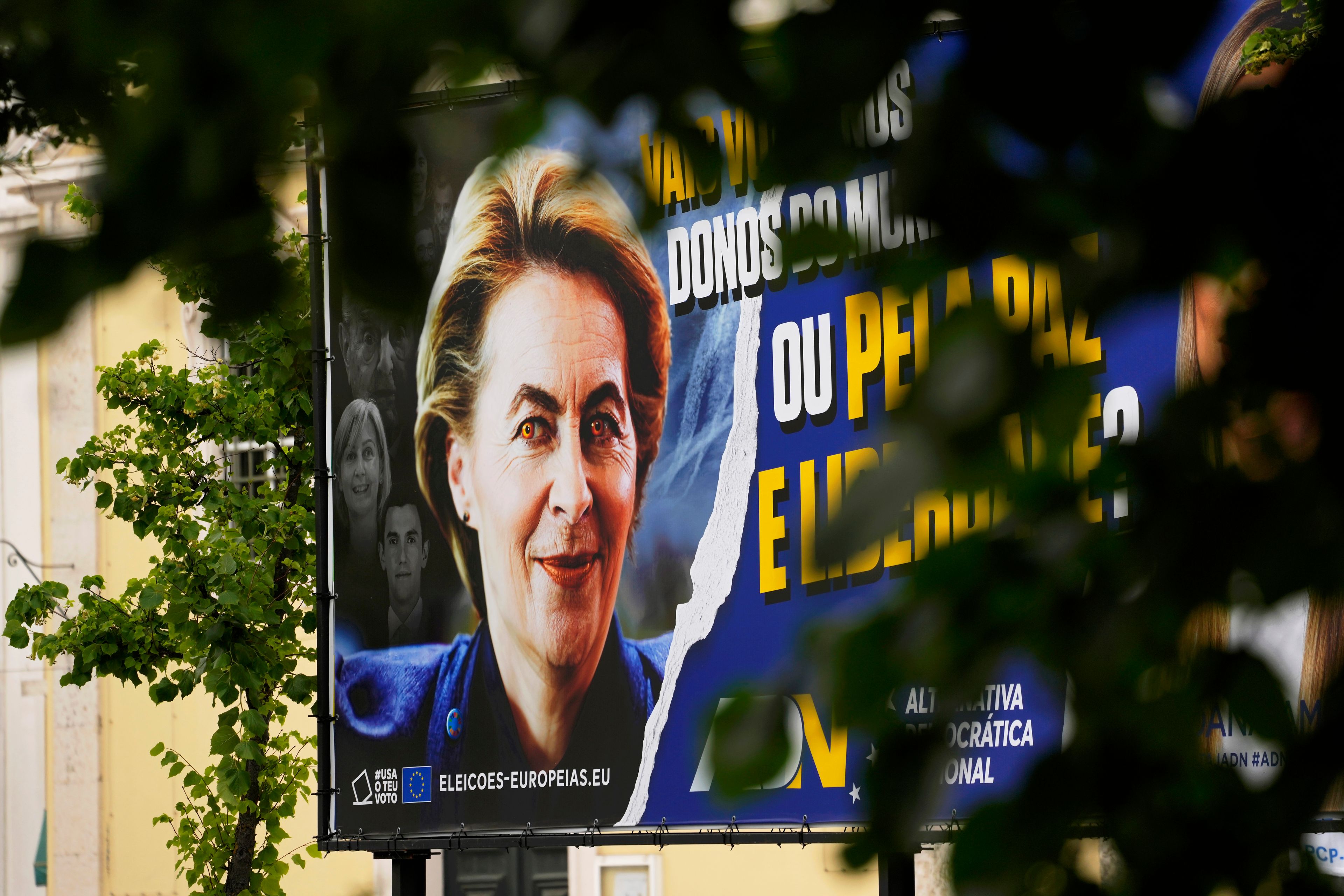 A picture of the European Commission president Ursula von der Leyen, with red eyes, is displayed on a European election campaign billboard of a minor Portuguese populist party, in Lisbon, Thursday, June 6, 2024. The National Democratic Alternative, ADN, has so far failed to elect any member of parliament in Portugal.