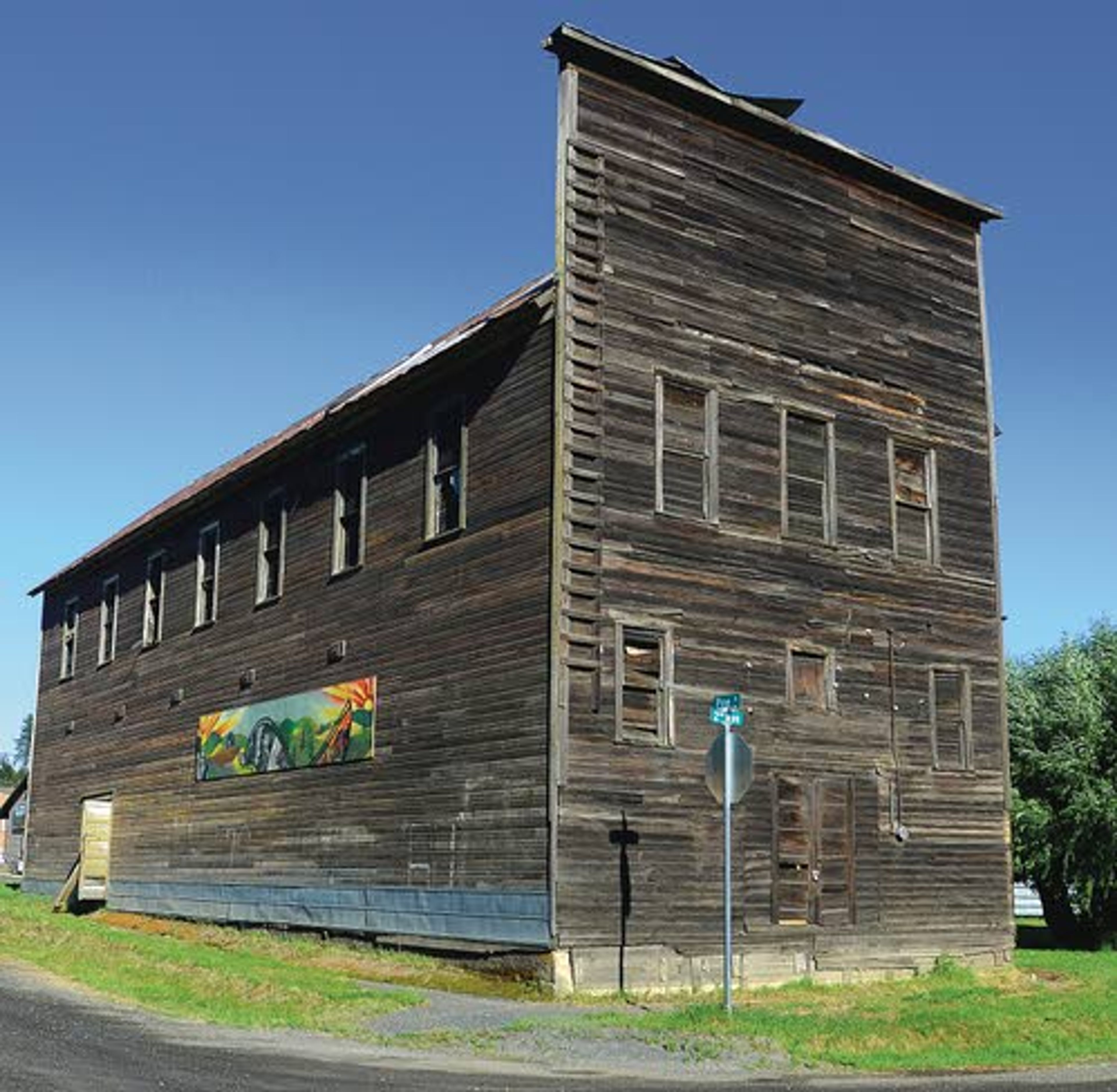 The paint is long gone from the exterior of the Bovill Opera House.