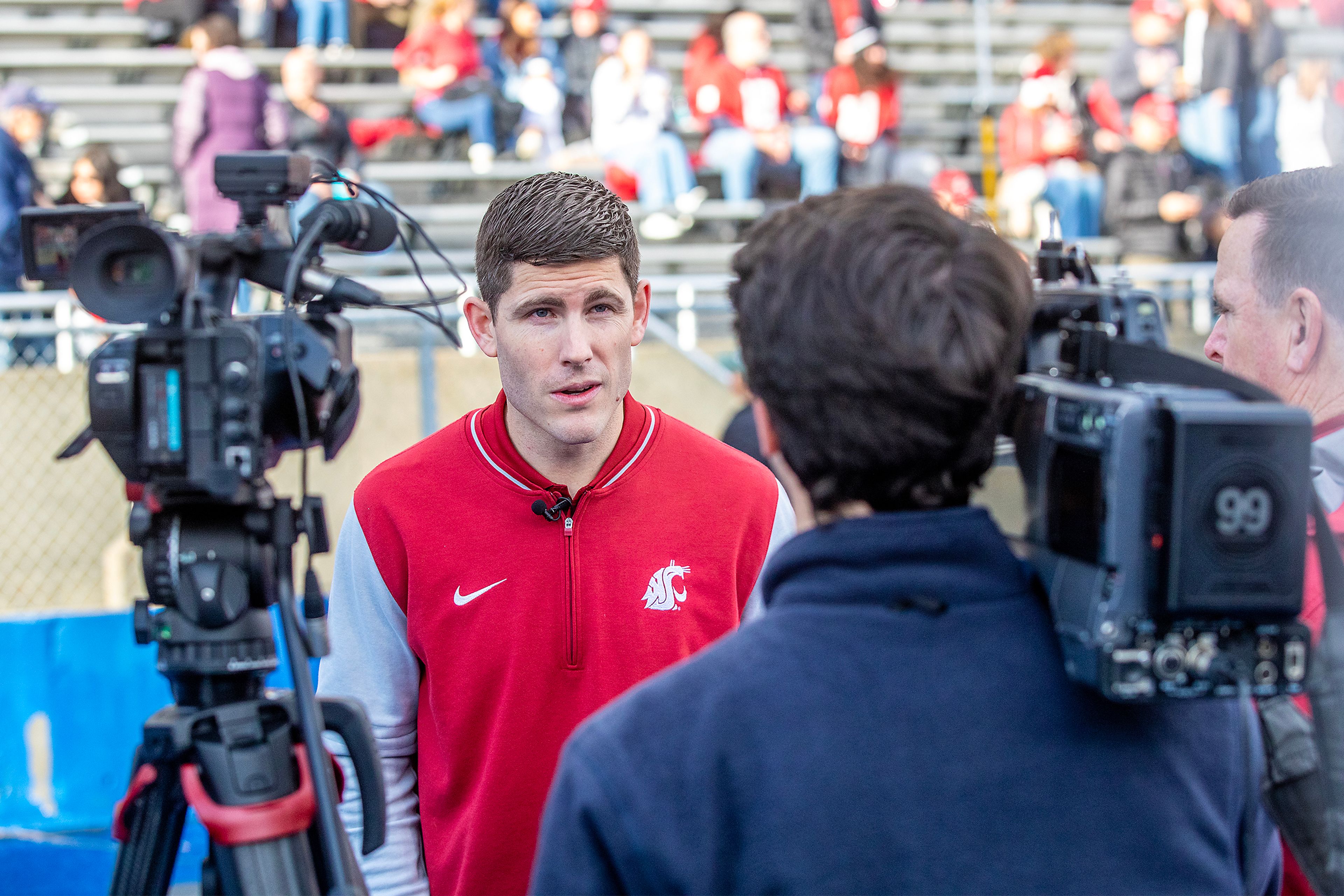 Washington State’s new head coach Kirby Moore is interviewed before the Famous Idaho Potato Bowl Monday at Albertsons Stadium in Boise. Washington State defeated Utah State 34-21.