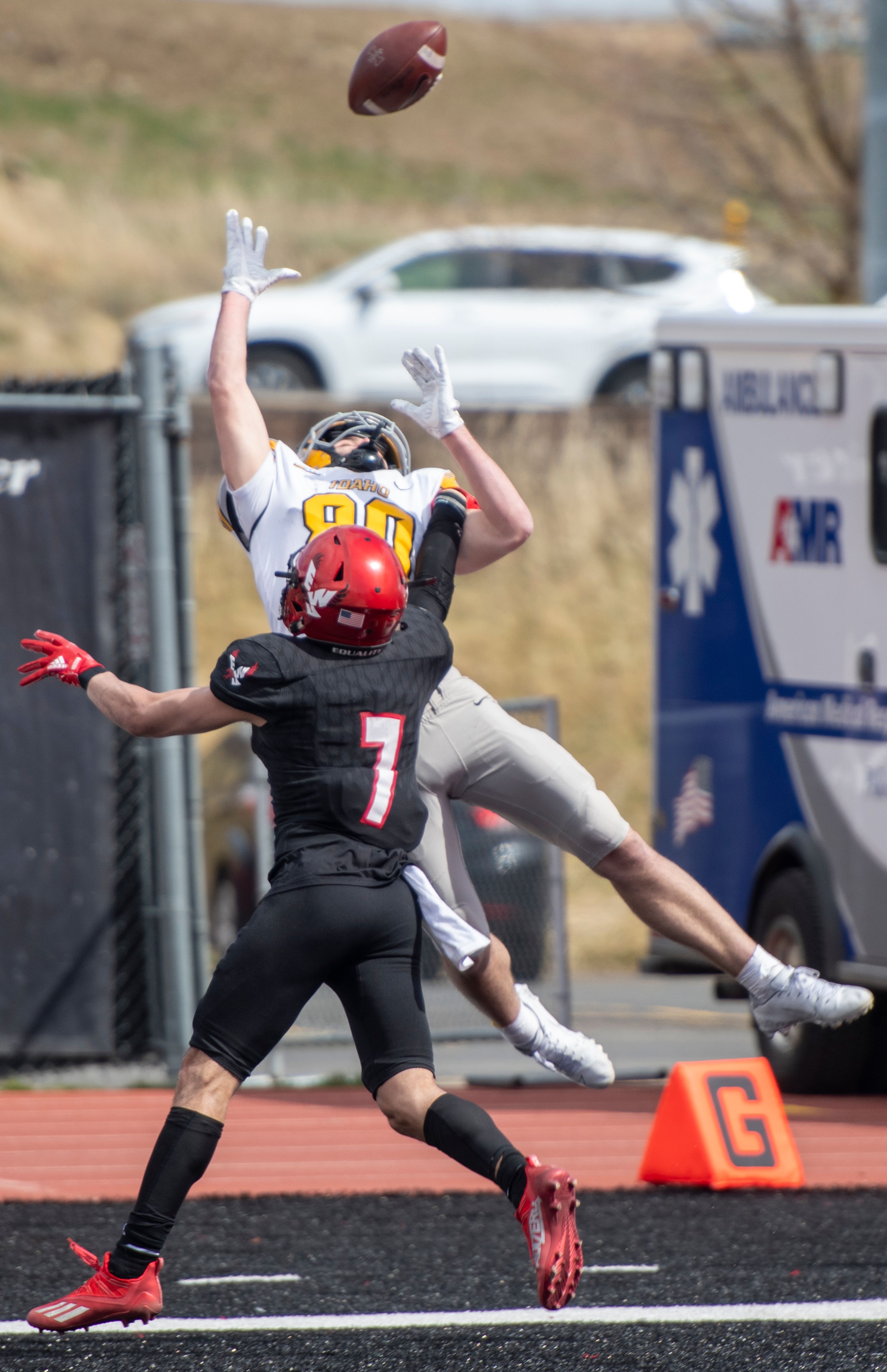 Idaho wide receiver Hayden Hatten (80) attempts to bring in a pass over Eastern Washington defensive back Tre Weed (7) during the third quarter of a Big Sky Conference matchup at Roos Field on Saturday afternoon. Eastern Washington defeated Idaho 38-31.