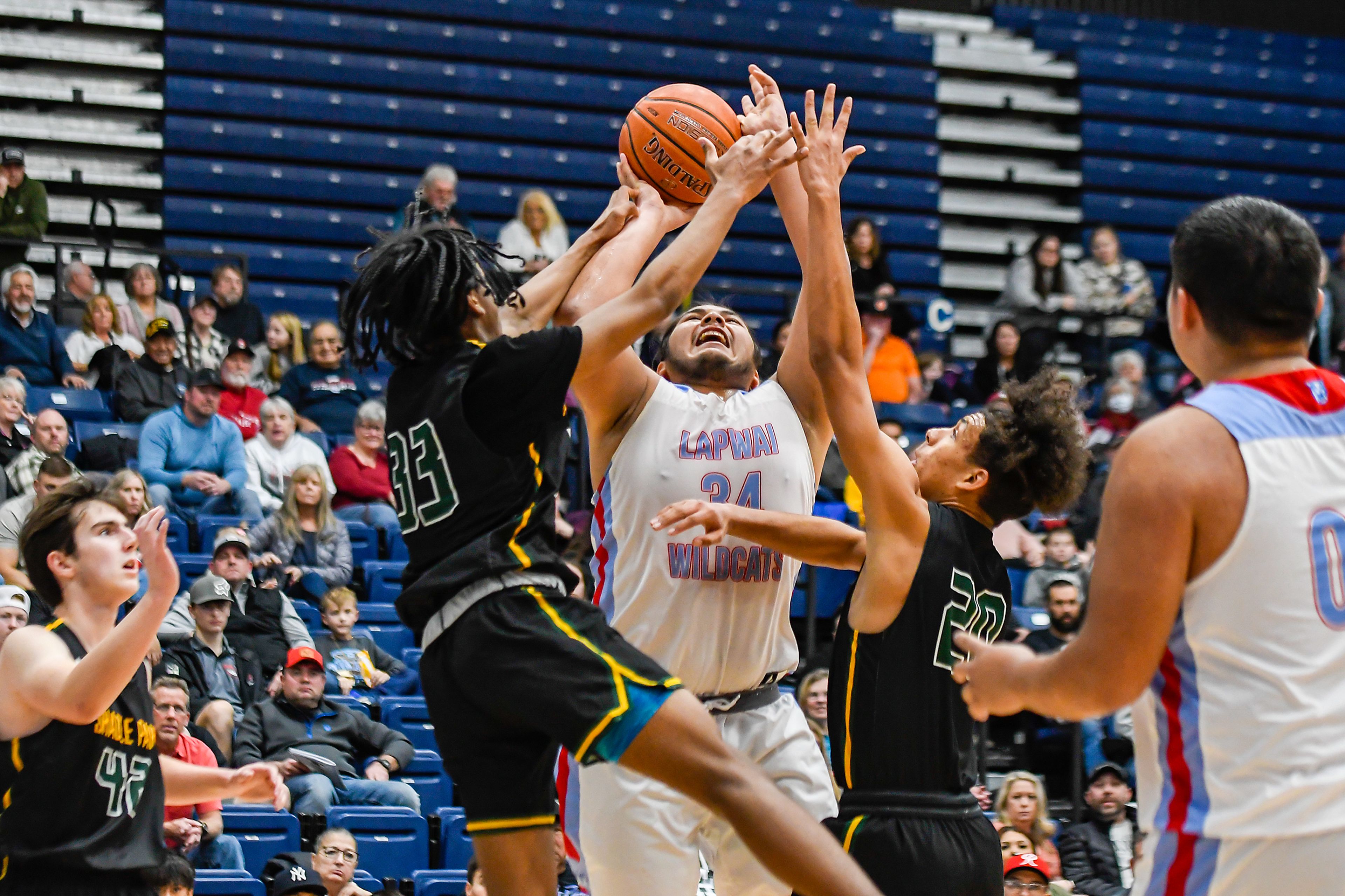 Lapwai forward Christopher Bohnee shoots Thursday during the Avista Holiday Tournament boys basketball final against Shadle Park at the P1FCU Activity Center in Lewiston.