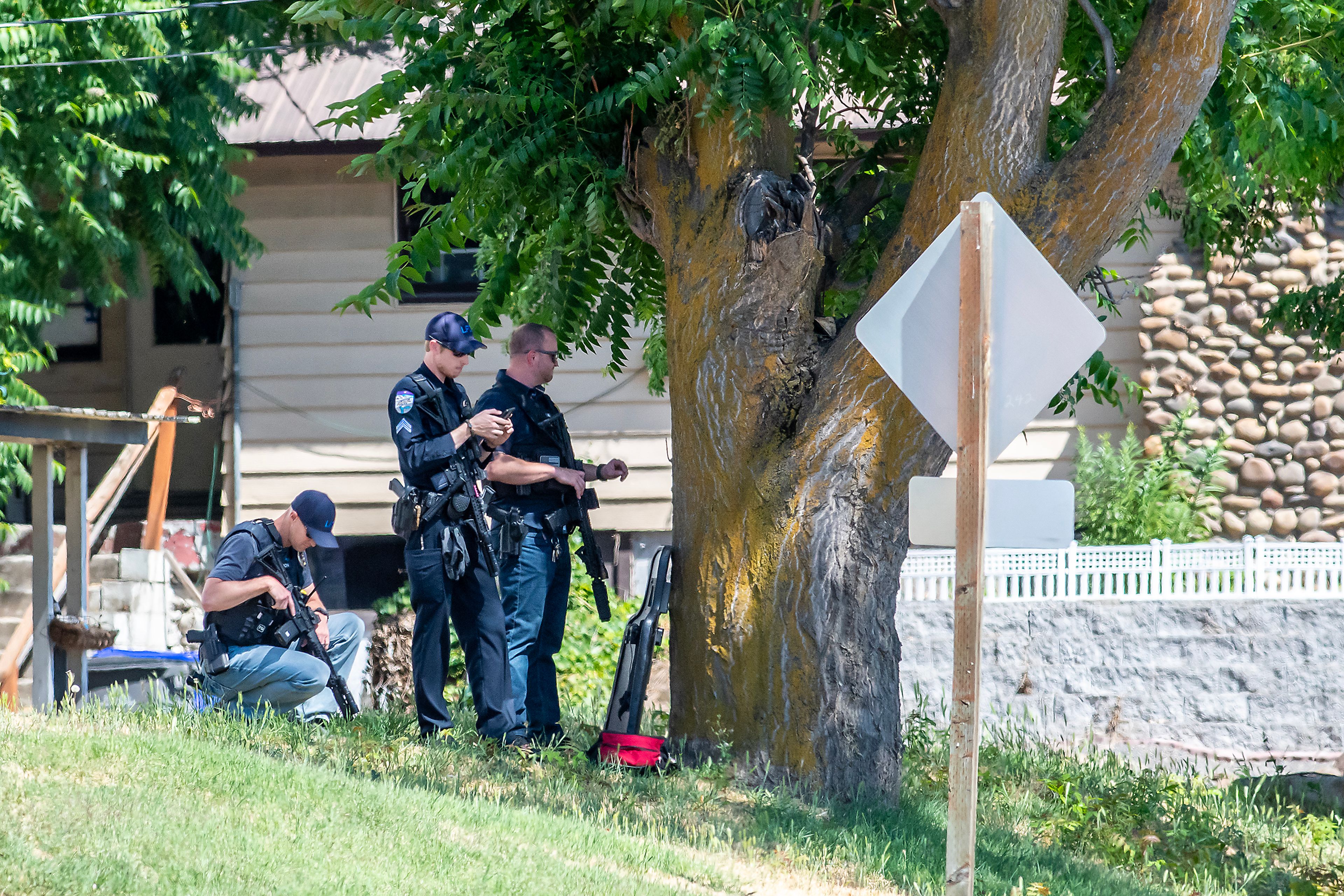 Officers stand by at the scene of what came in as a shots fired call over the scanner Tuesday along Lapwai Road.