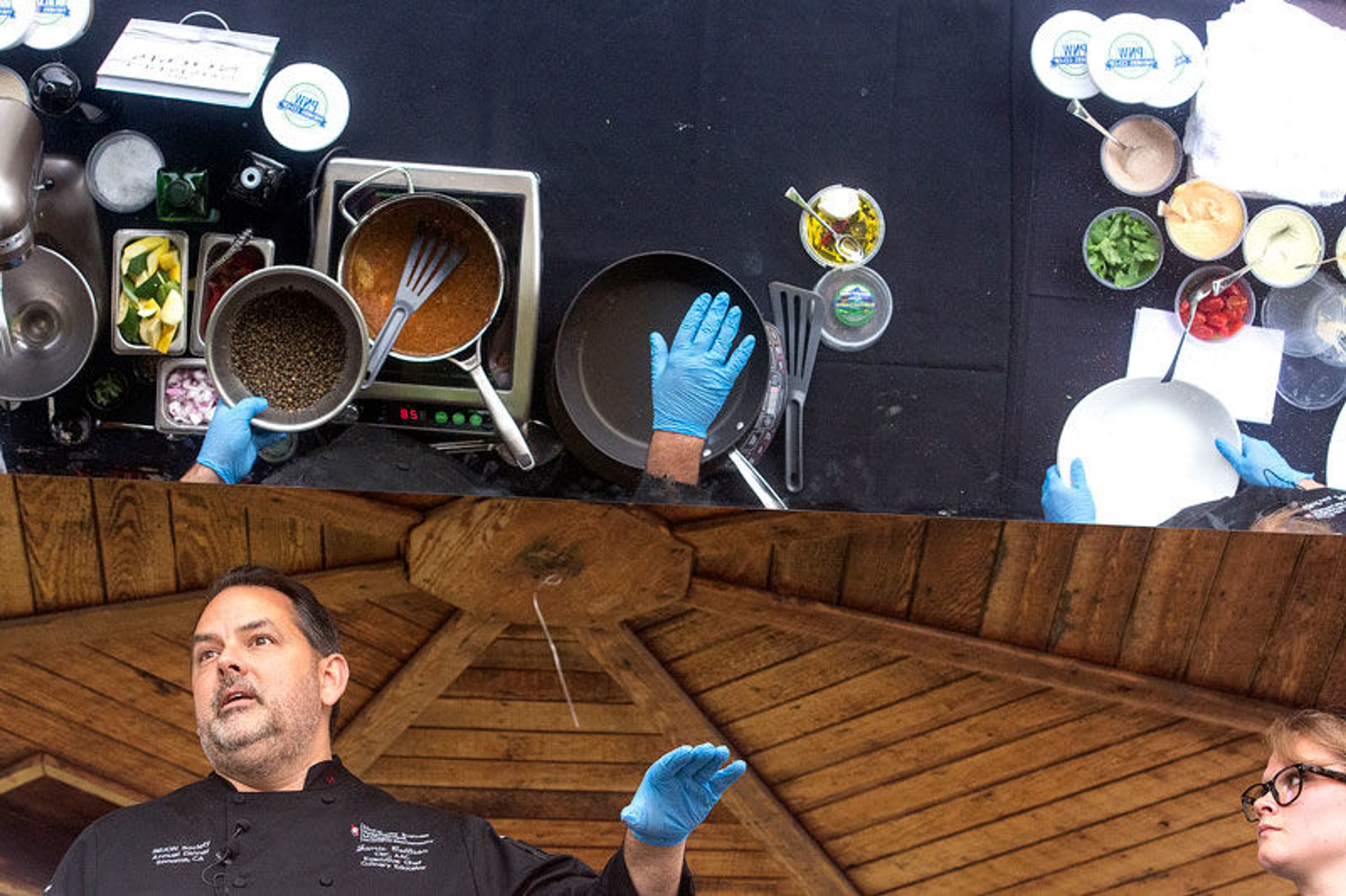 Jamie Callison, executive chef in the WSU School of Hospitality Business Management, left, and Chelsea Price, a senior at WSU studying food science nutrition, do a live cooking demo on Saturday afternoon at the National Lentil Festival at Reaney Park in Pullman.