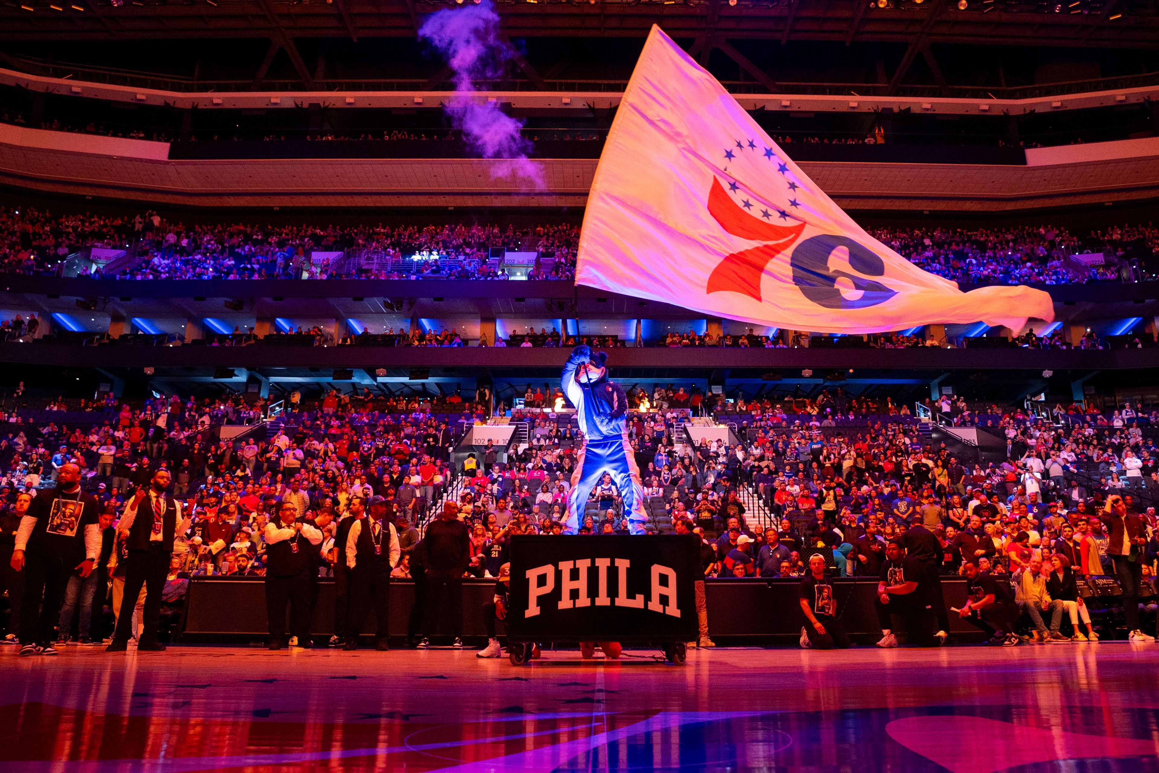 FILE - Philadelphia 76ers mascot Franklin waves the flag during pre-game introductions prior to the NBA basketball game against the Brooklyn Nets, April 14, 2024, in Philadelphia.