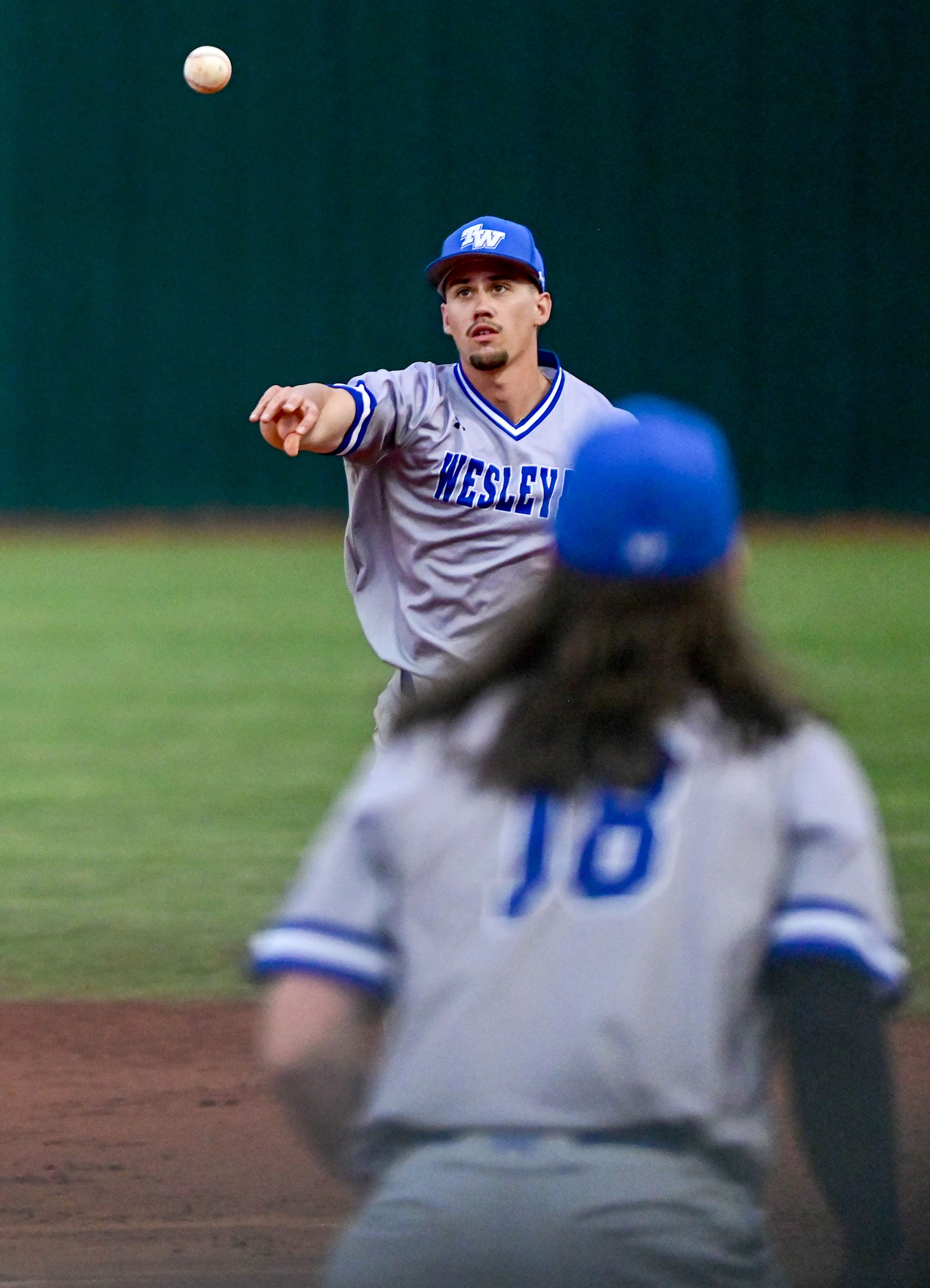 Tennessee Wesleyan’s Cayle Webster throws the ball to first base during a final inning against the Cumberlands on the opening day of the NAIA World Series at Harris Field in Lewiston on Friday.