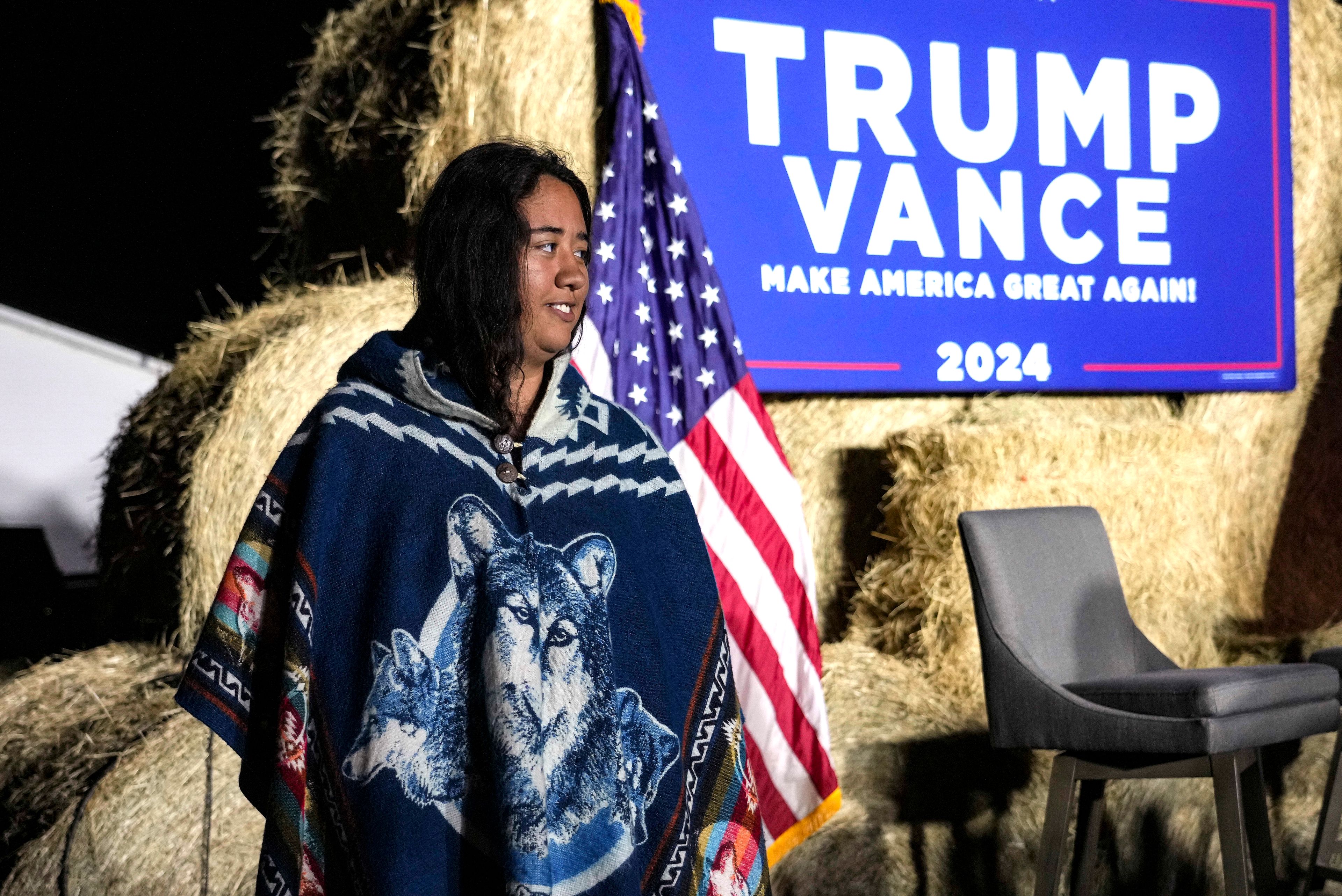 FILE - Abigail Blue, a member of the Lumbee Tribe, walks by the stage during a campaign event in support of Republican presidential nominee former President Donald Trump, Oct. 18, 2024, in Red Springs, N.C. (AP Photo/David Yeazell, File)