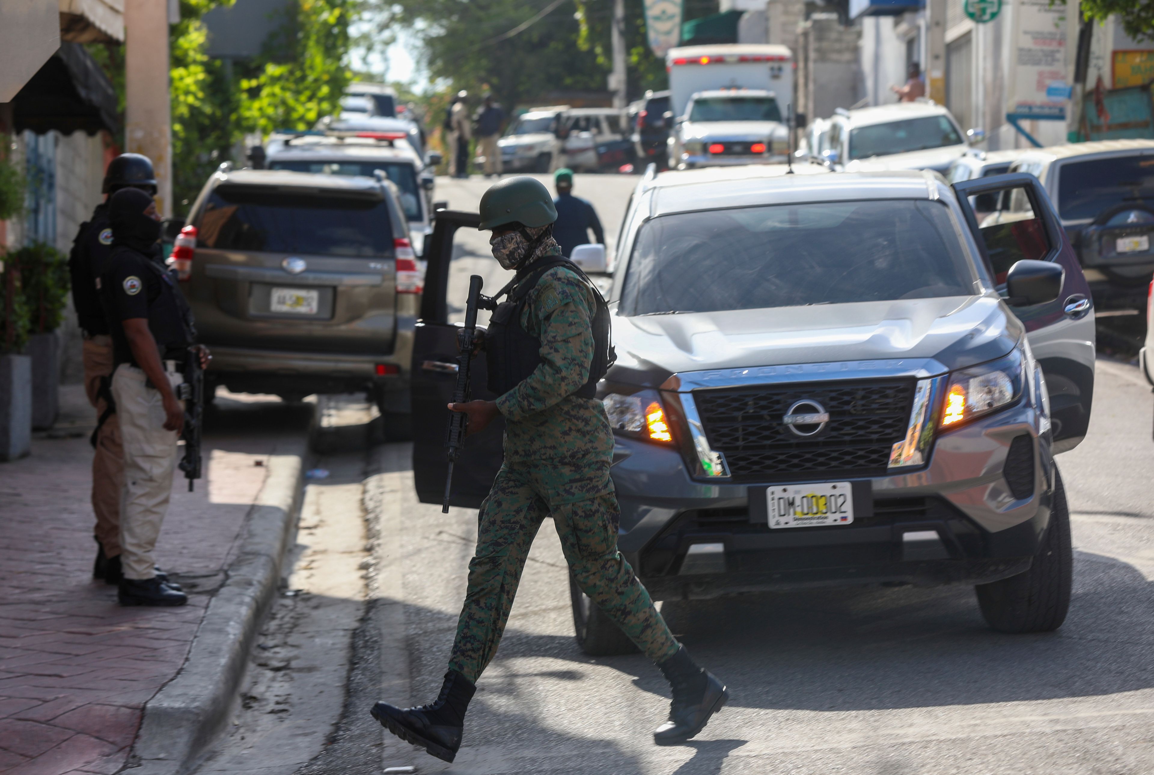 Police guard the hospital where Haiti's new prime minister, Garry Conille, was hospitalized a day prior in Port-au-Prince, Sunday, June 9, 2024.