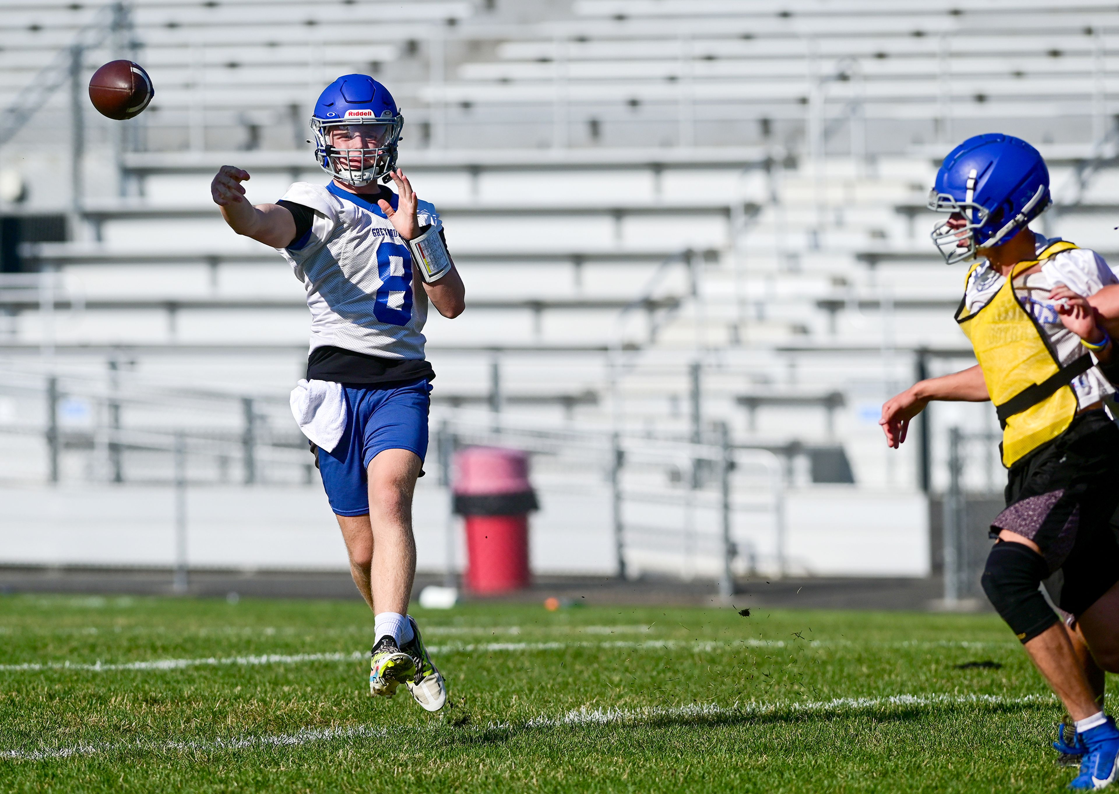 Pullman junior quarterback Connor Stewart passes the ball at practice on Wednesday.