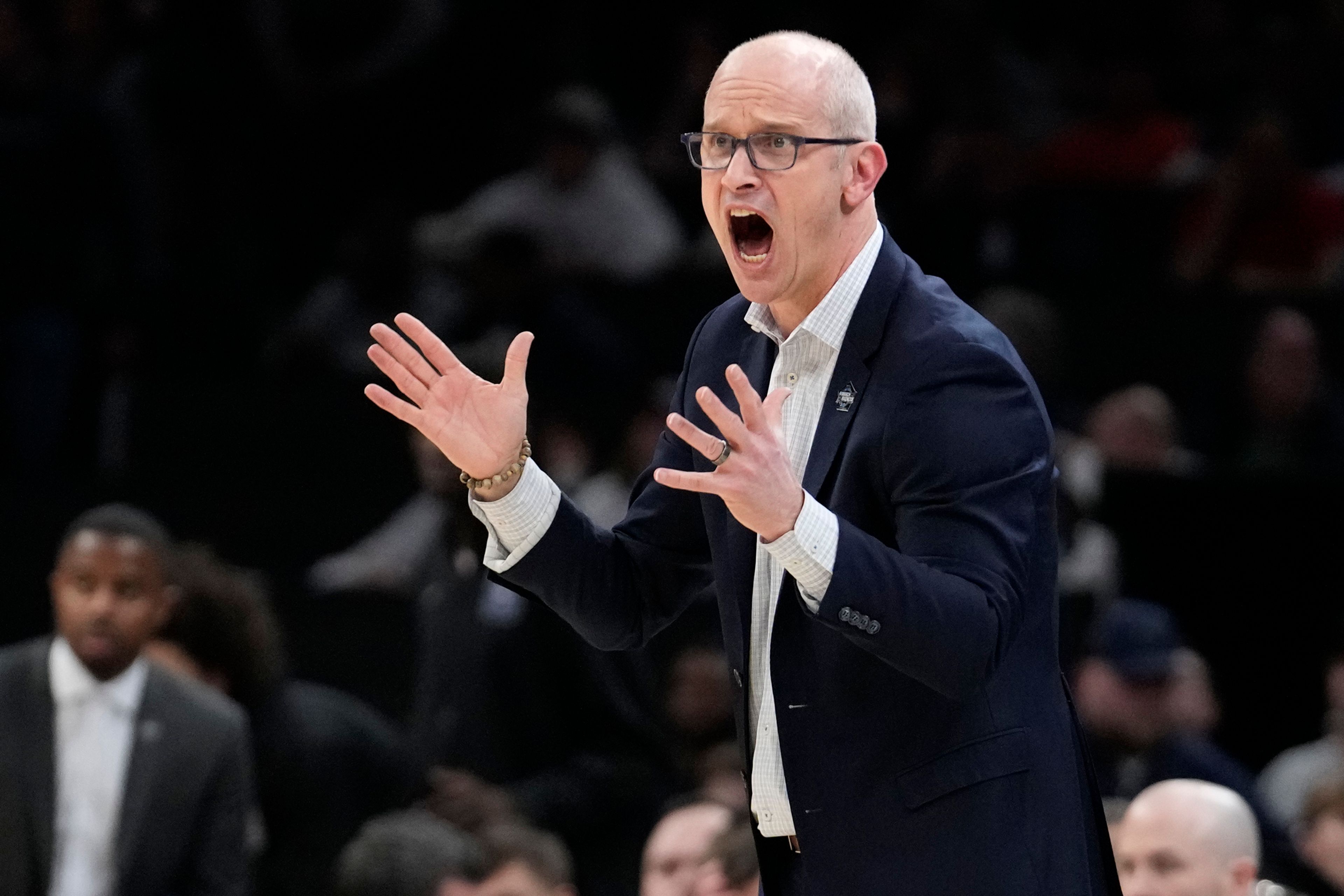 FILE - UConn head coach Dan Hurley calls towards his players during the first half of the Elite 8 college basketball game against Illinois in the men's NCAA Tournament, Saturday, March 30, 2024, in Boston. The Los Angeles Lakers’ reported plan to offer a massive contract to UConn coach Dan Hurley is the latest twist in the monthlong race to replace Darvin Ham.