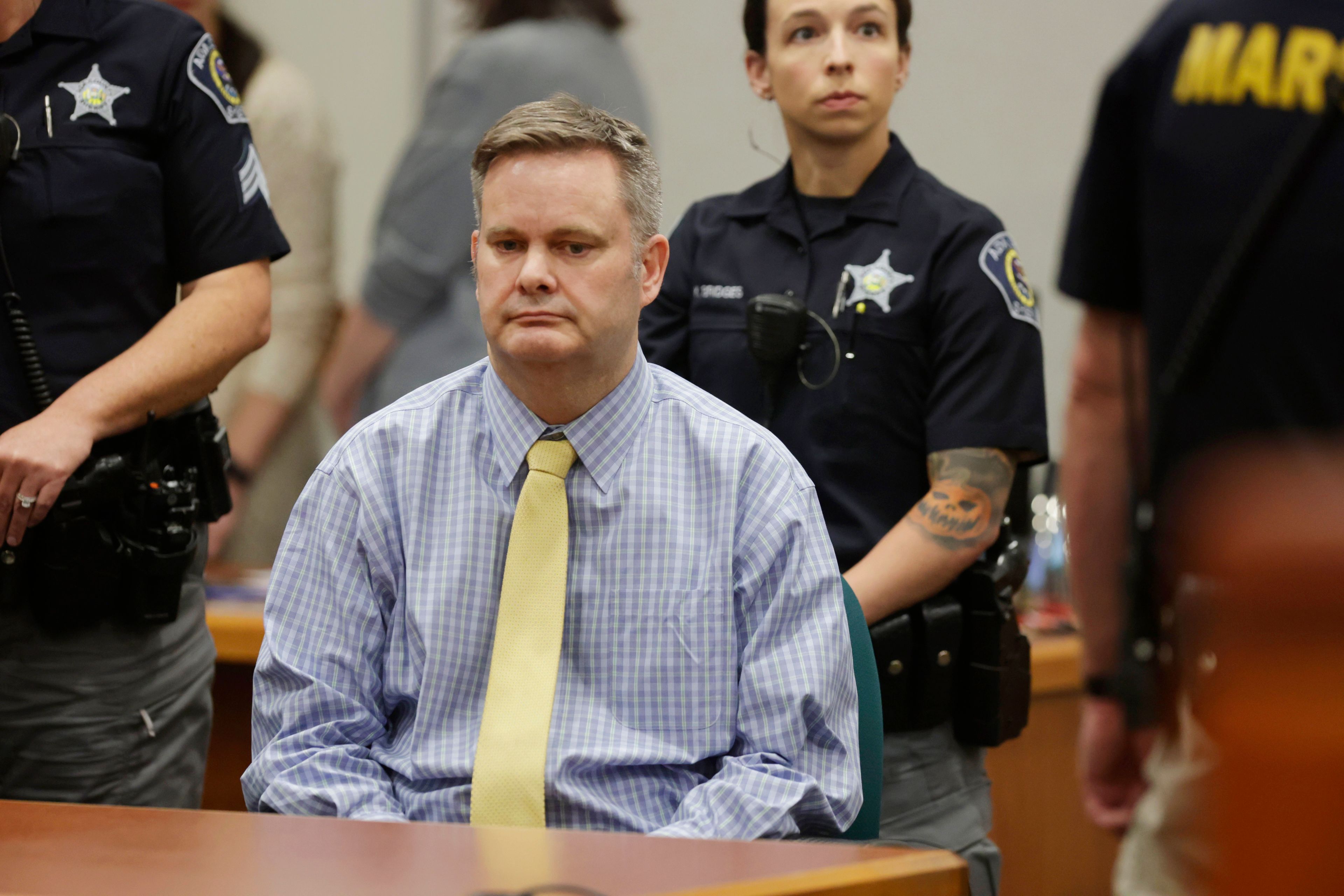 Chad Daybell sits at the defense table after the jury's verdict in his murder trial was read at the Ada County Courthouse in Boise, Idaho, on Thursday, May 30, 2024. Daybell was convicted of killing his wife and his new girlfriend's two youngest kids in a strange triple murder case that included claims of apocalyptic prophesies, zombie children and illicit affairs. ( AP Photo/Kyle Green, Pool)