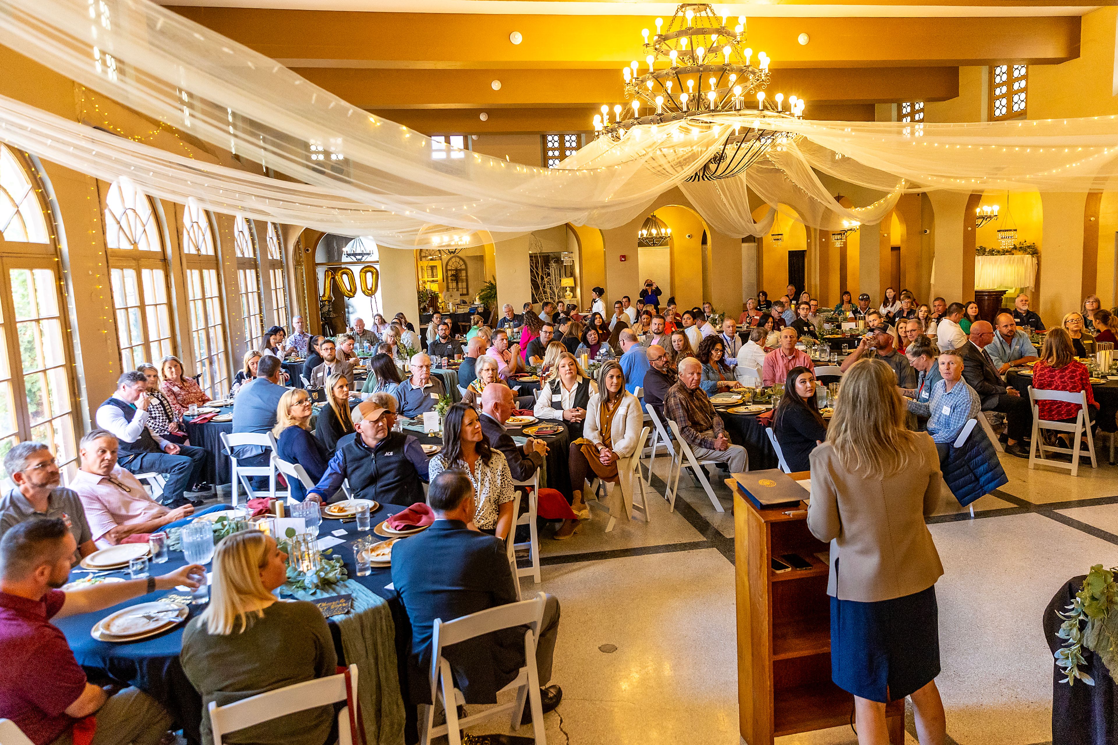 People attend a chamber of commerce event celebrating 100-year-old businesses Wednesday at the Lewis Clark Hotel in Lewiston.