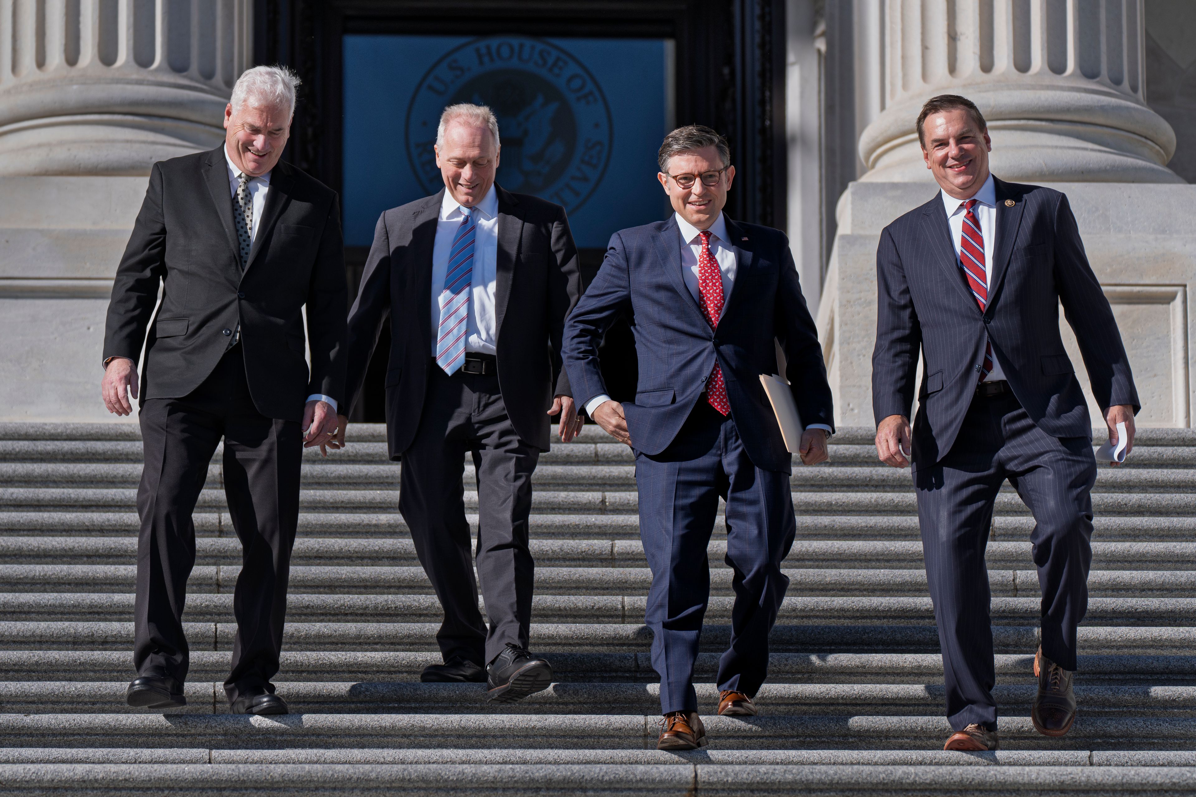 House Republican leaders, from left, Majority Whip Tom Emmer, R-Minn., Majority Leader Steve Scalise, R-La., Speaker of the House Mike Johnson, R-La., and Rep. Richard Hudson, R-N.C., chairman of the National Republican Congressional Committee, arrive to tout Republican wins and meet with reporters on the steps of the Capitol in Washington, Tuesday, Nov. 12, 2024. Congress returns to work this week to begin what is known as a lame-duck session â€” that period between Election Day and the end of the two-year congressional term. (AP Photo/J. Scott Applewhite)