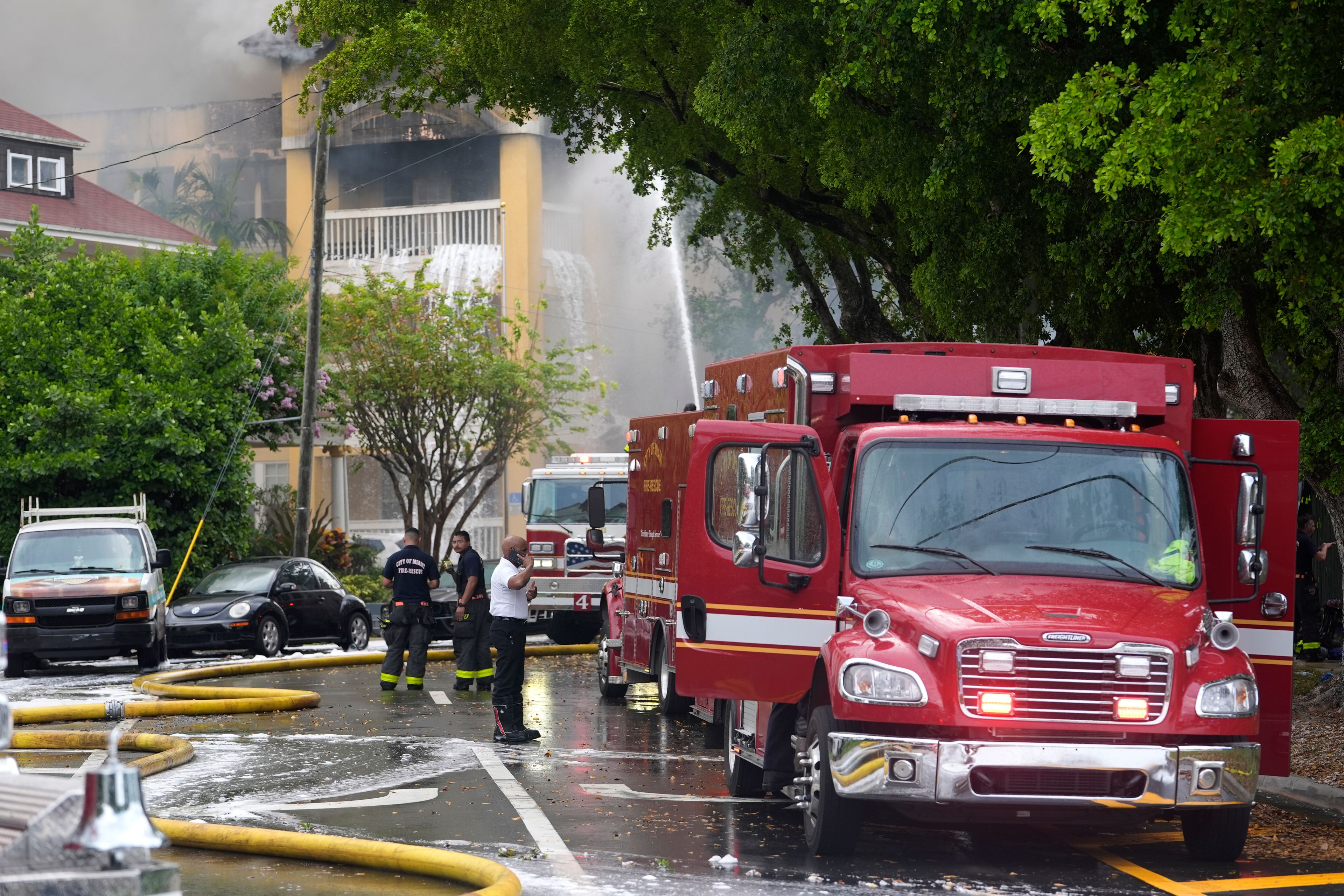 City of Miami Fire Rescue firefighters work at the scene of a fire at the Temple Court apartments Monday, June 10, 2024, in Miami.