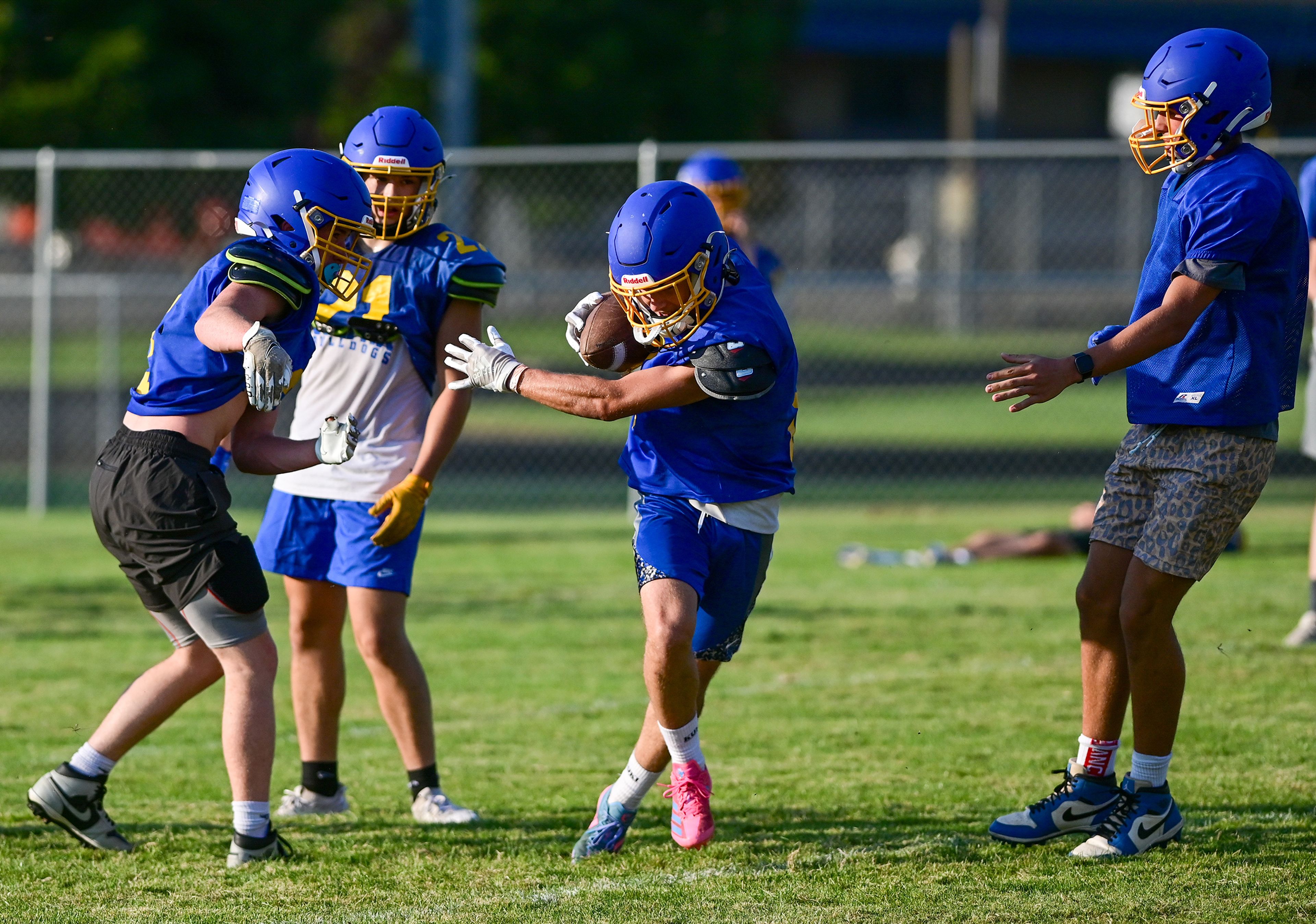 Colfax runs through plays at practice on Tuesday.