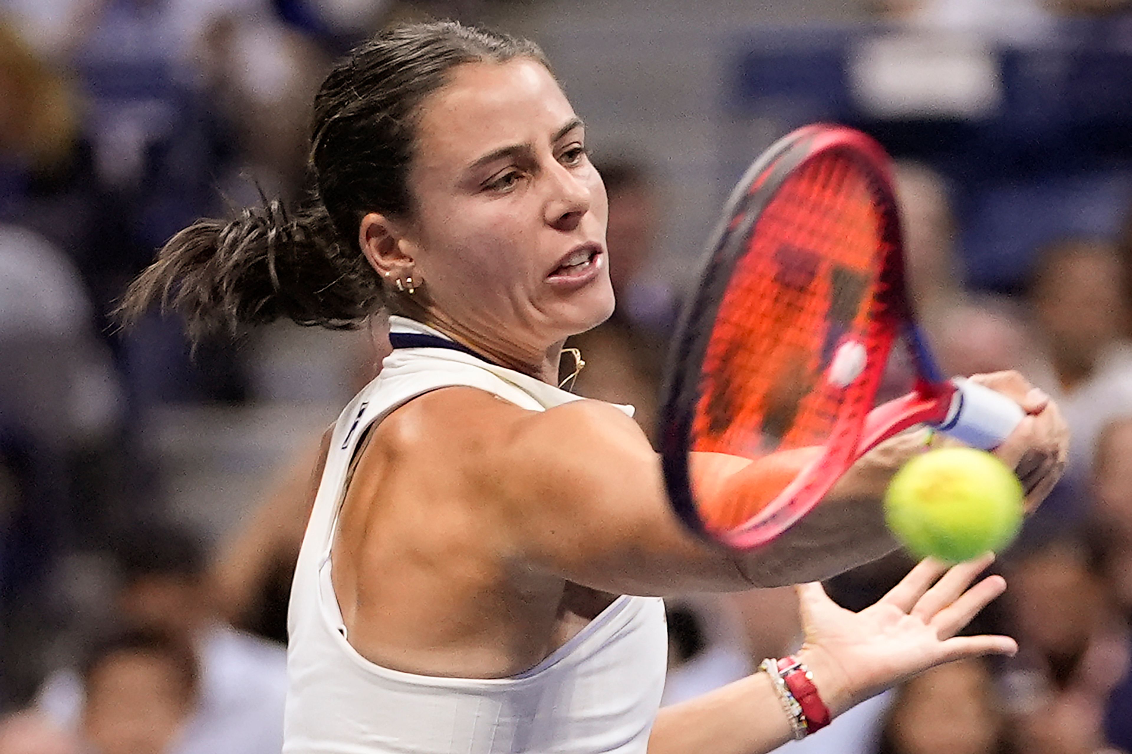 Emma Navarro, of the United States, returns a shot to Aryna Sabalenka, of Belarus, during the women's singles semifinals of the U.S. Open tennis championships, Thursday, Sept. 5, 2024, in New York.