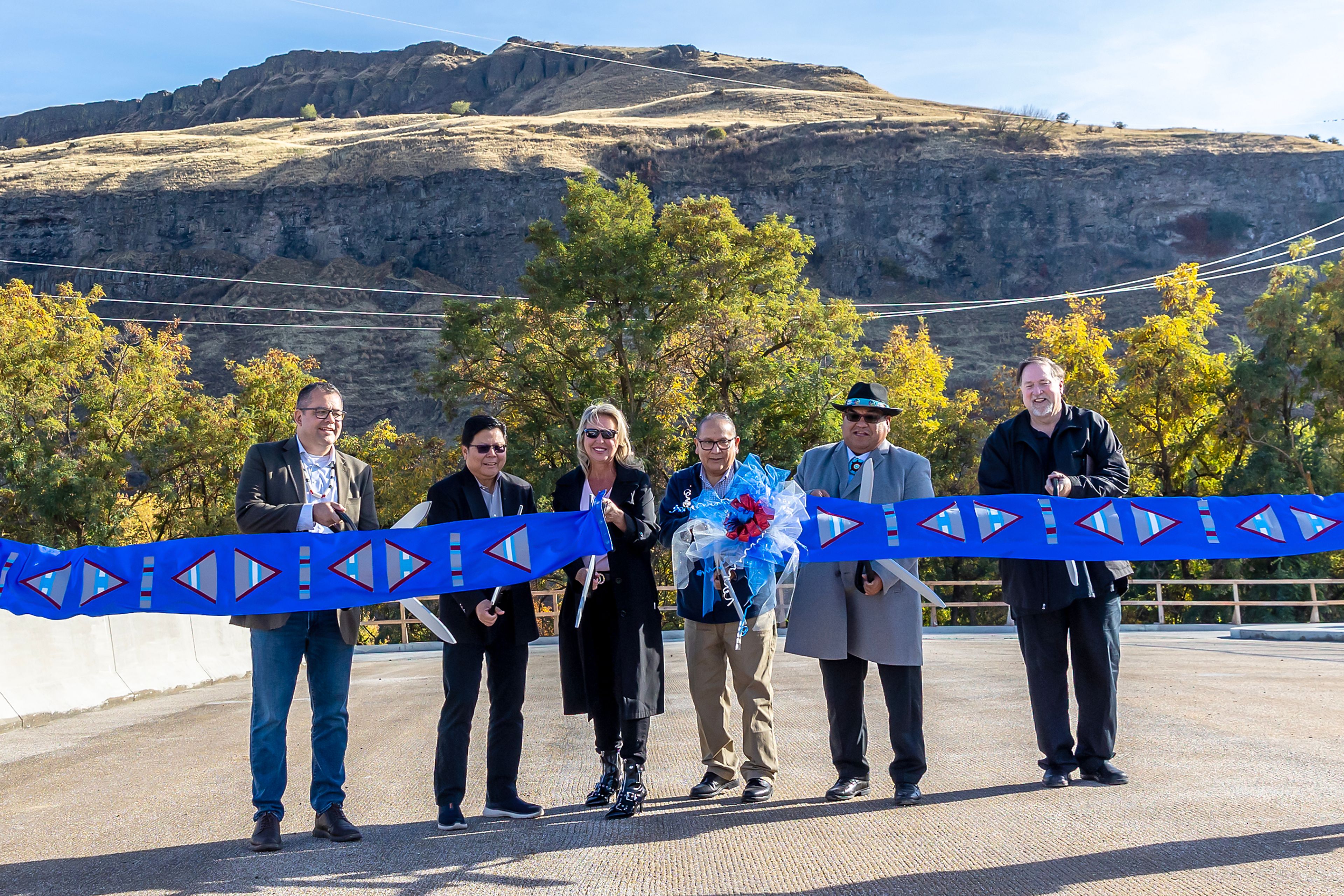 Honored speakers cut the ribbon Thursday for the Aht�Wy Interchange over U.S. Highway 95/12 in Lewiston.