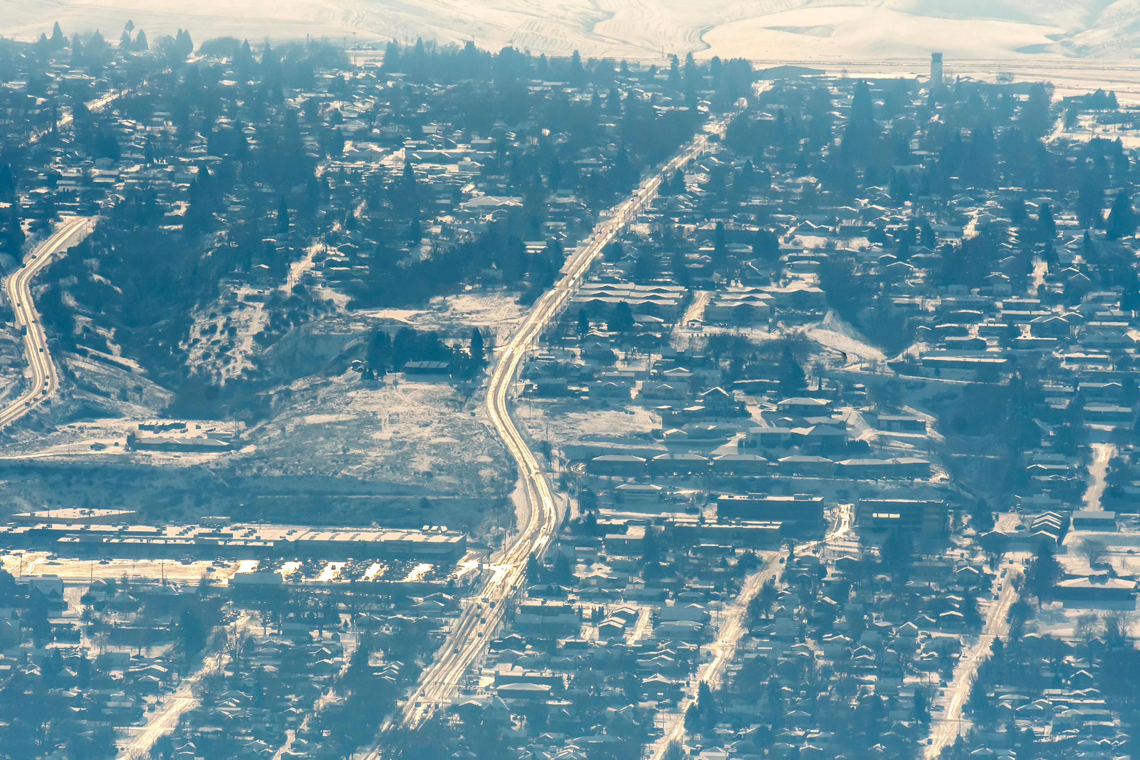 Sun glints off of shiny and icy streets in Lewiston earlier this week.