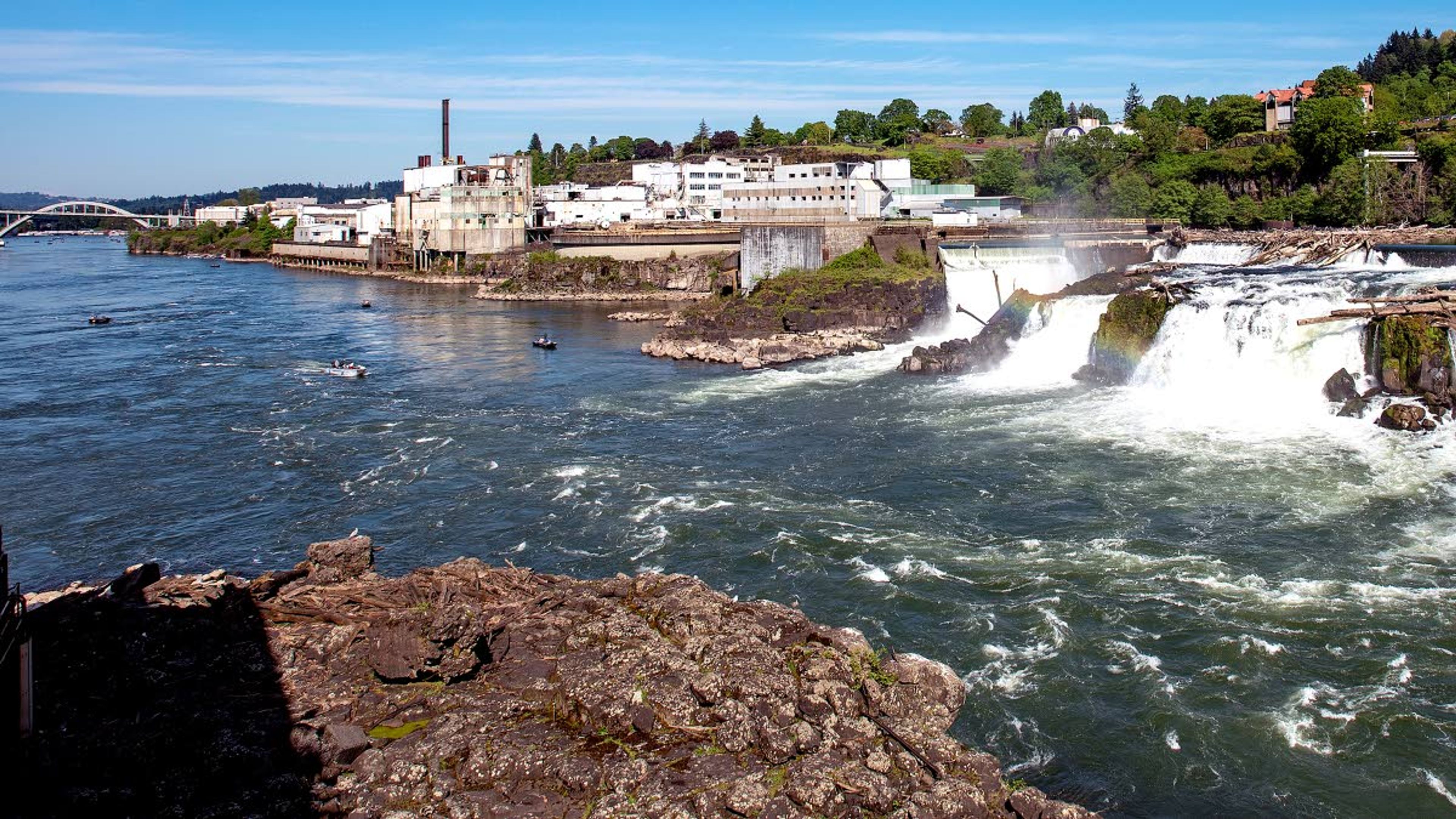 In this May 2, 2018 file photo, downtown Oregon City, Ore., is seen alongside the north end of the Willamette Falls.