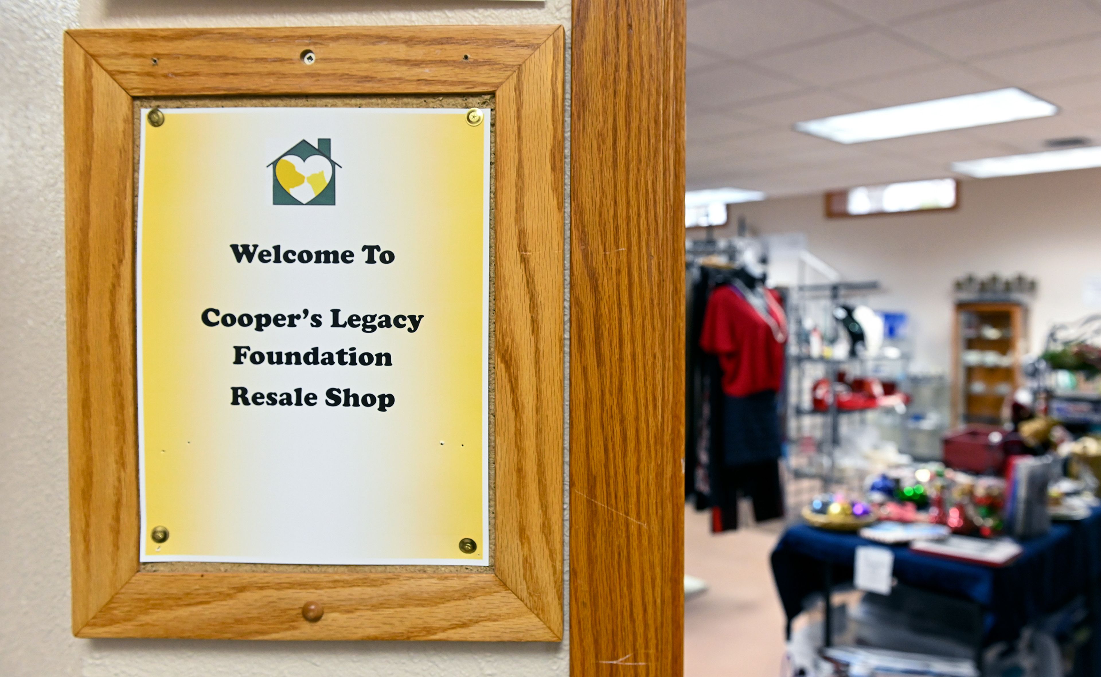 A sign hangs outside the main room of Cooper’s Legacy Foundation Resale Shop Wednesday in Pullman.