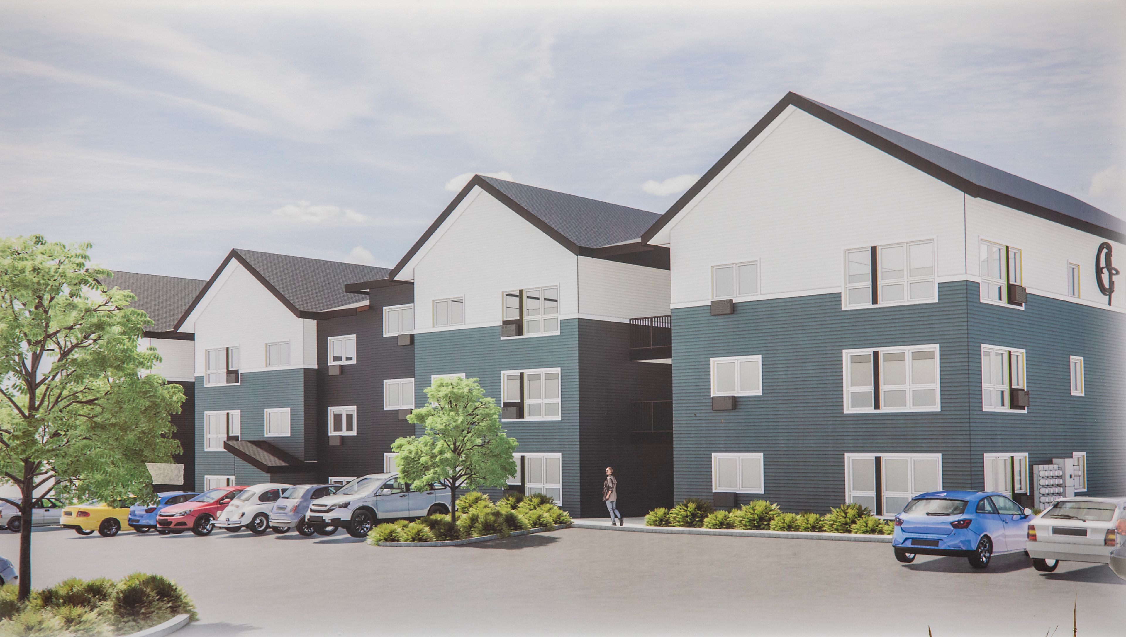 A rendering shows what the apartments along Port Drive will look like at the groundbreaking ceremony Monday in Clarkston.