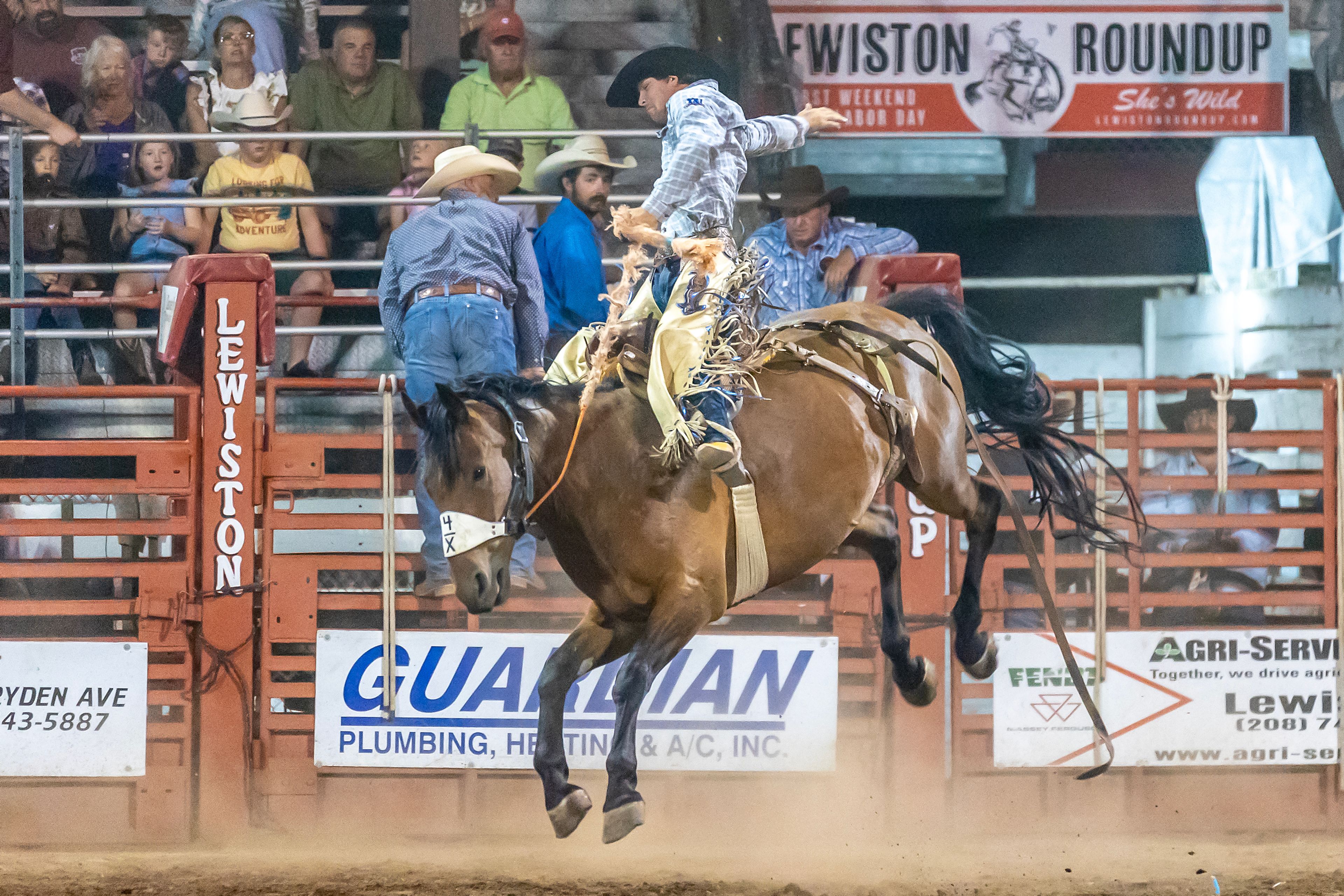 Logan Cook rides Pt Barnum to victory in the saddle bronc competition on day 2 of the Lewiston Roundup.