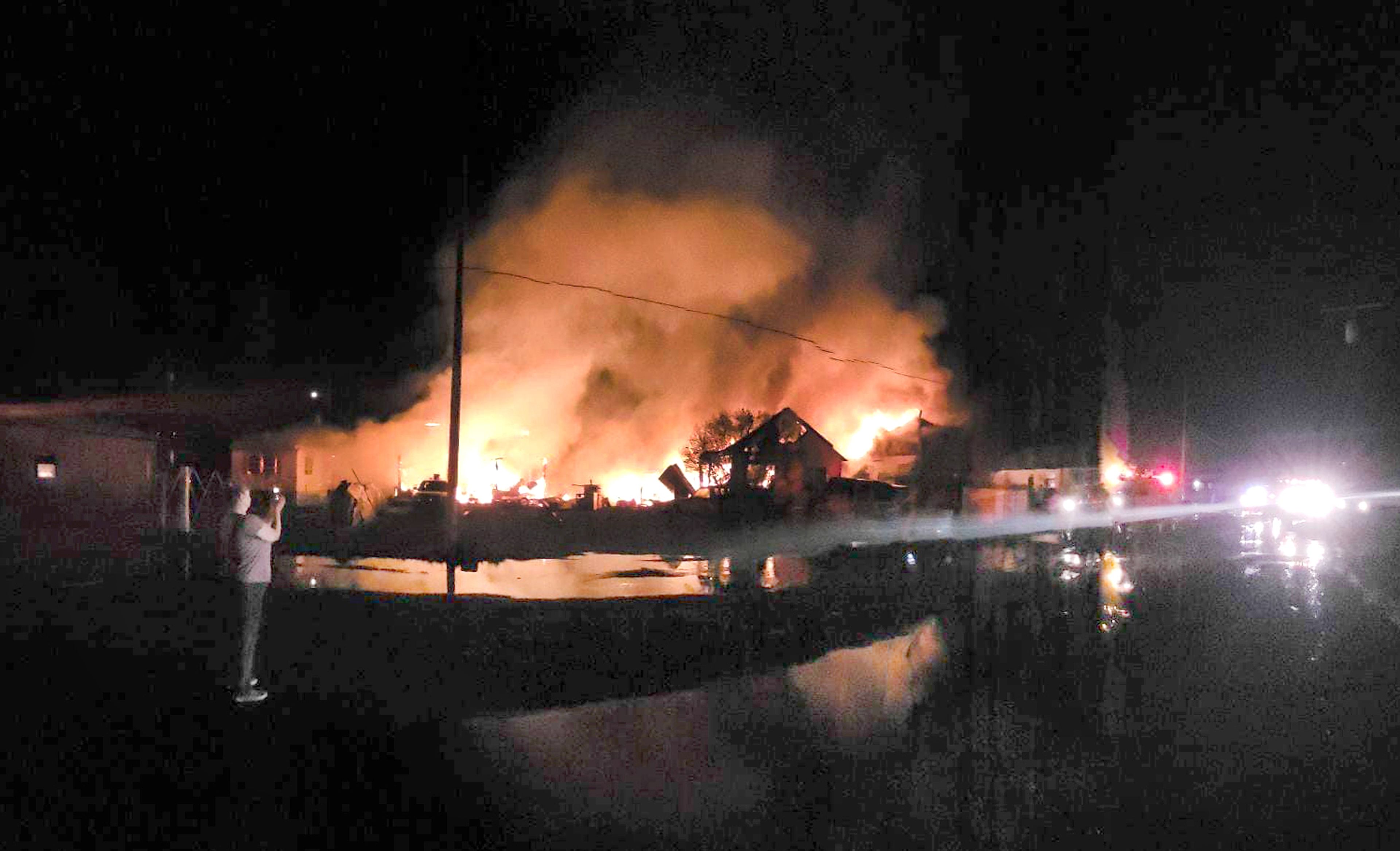 Structures burn along Fall Avenue in Kooskia on Sunday night.