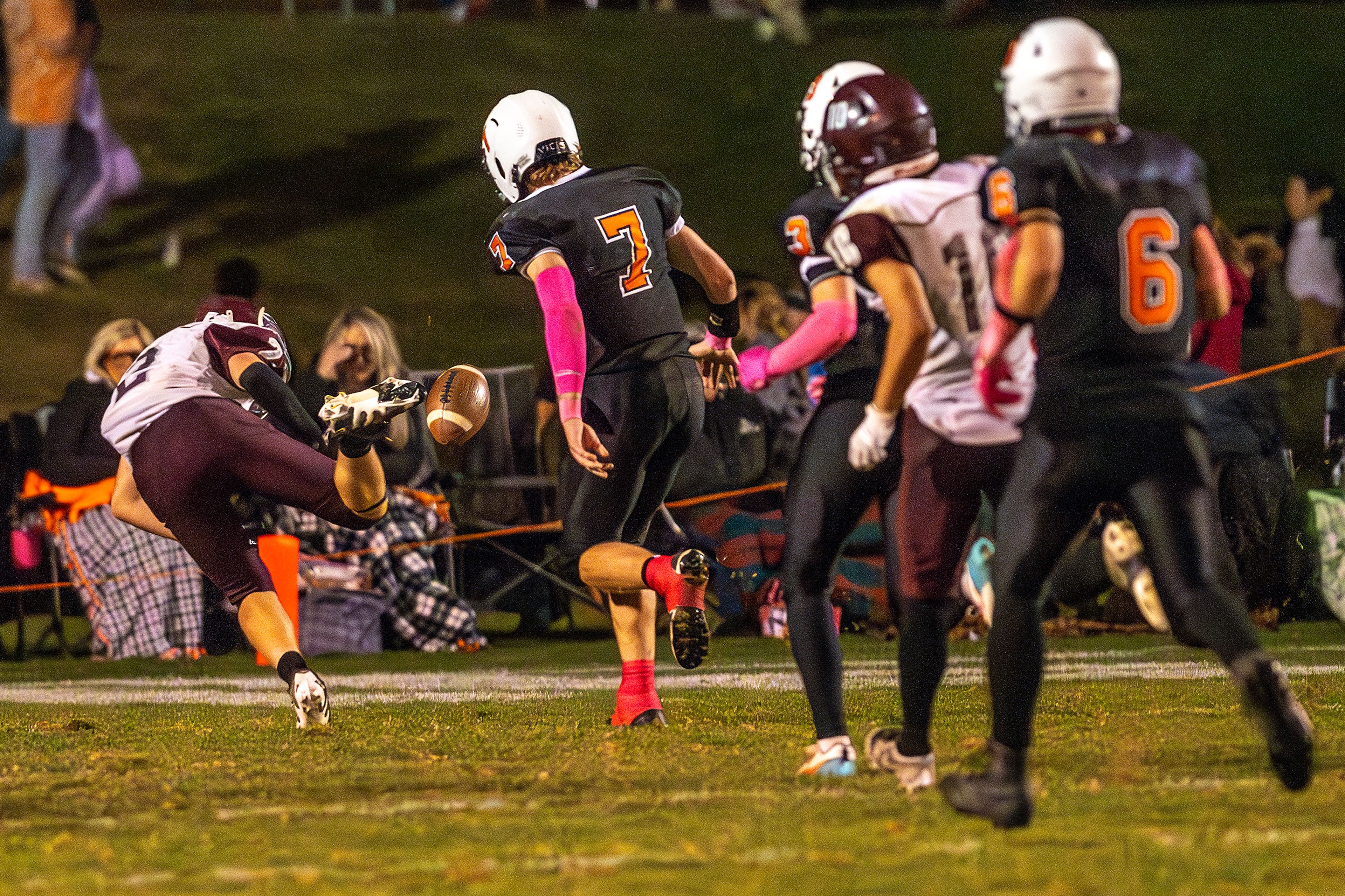 Reardan�s Hunter Flaa fumbles the ball after a push to the back from Asotin defensive back Cody Ells (7) during a Northeast 2B League game Friday in Asotin.,