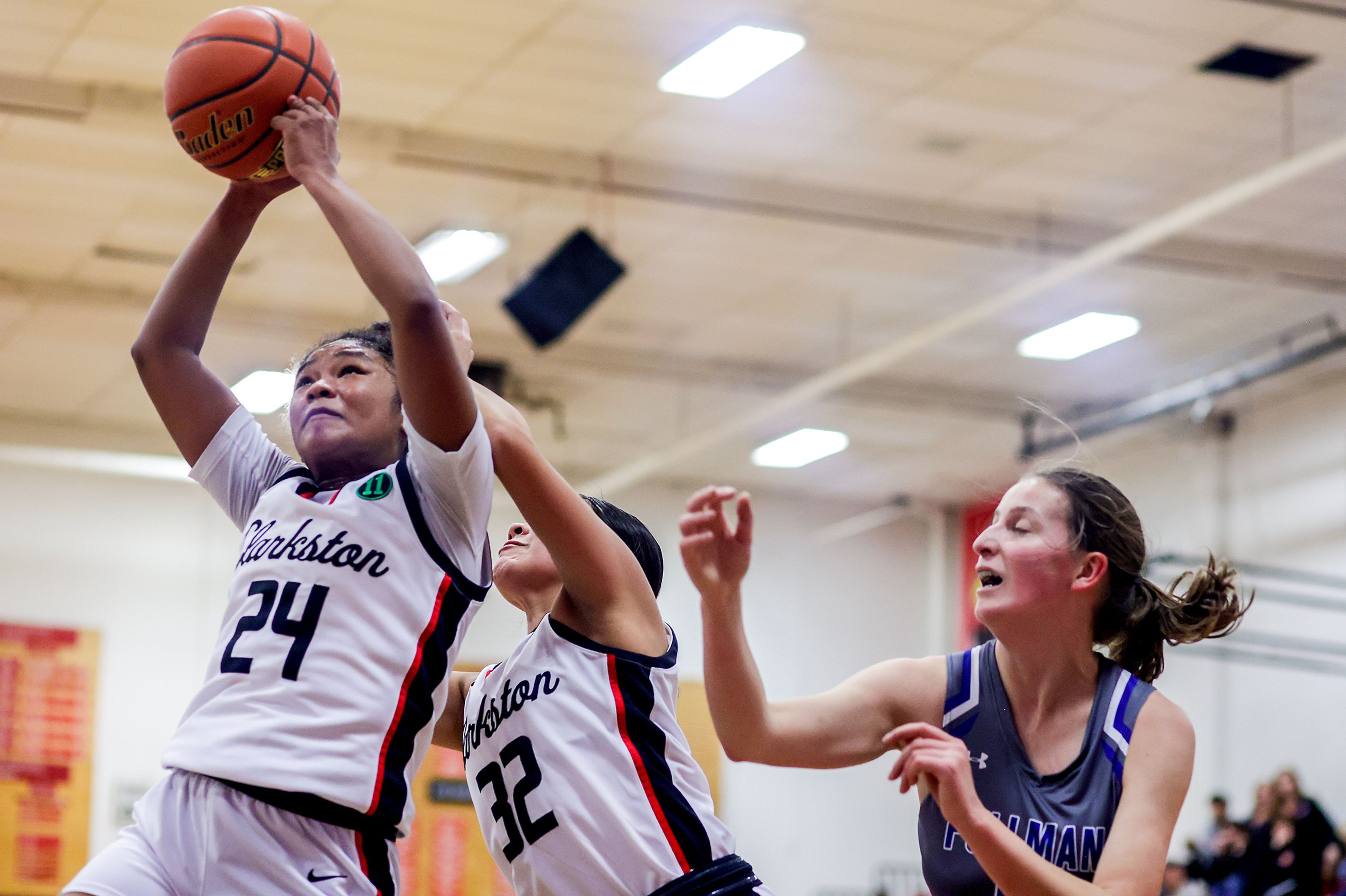 Clarkston wing Samara Powaukee, left grabs the rebound during Tuesday's Class 2A Greater Spokane League game against Pullman.