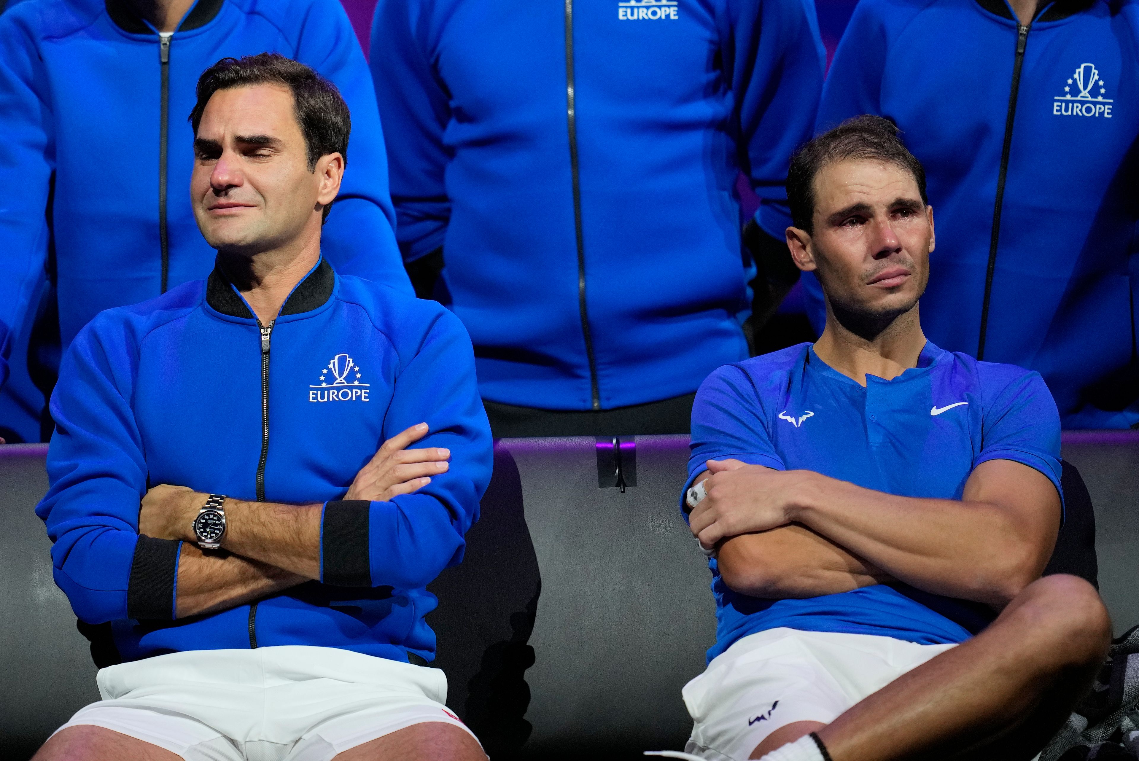 FILE - An emotional Roger Federer, left, of Team Europe, sits alongside his playing partner, Rafael Nadal, after their Laver Cup doubles match against Team World's Jack Sock and Frances Tiafoe at the O2 arena in London, Friday, Sept. 23, 2022.