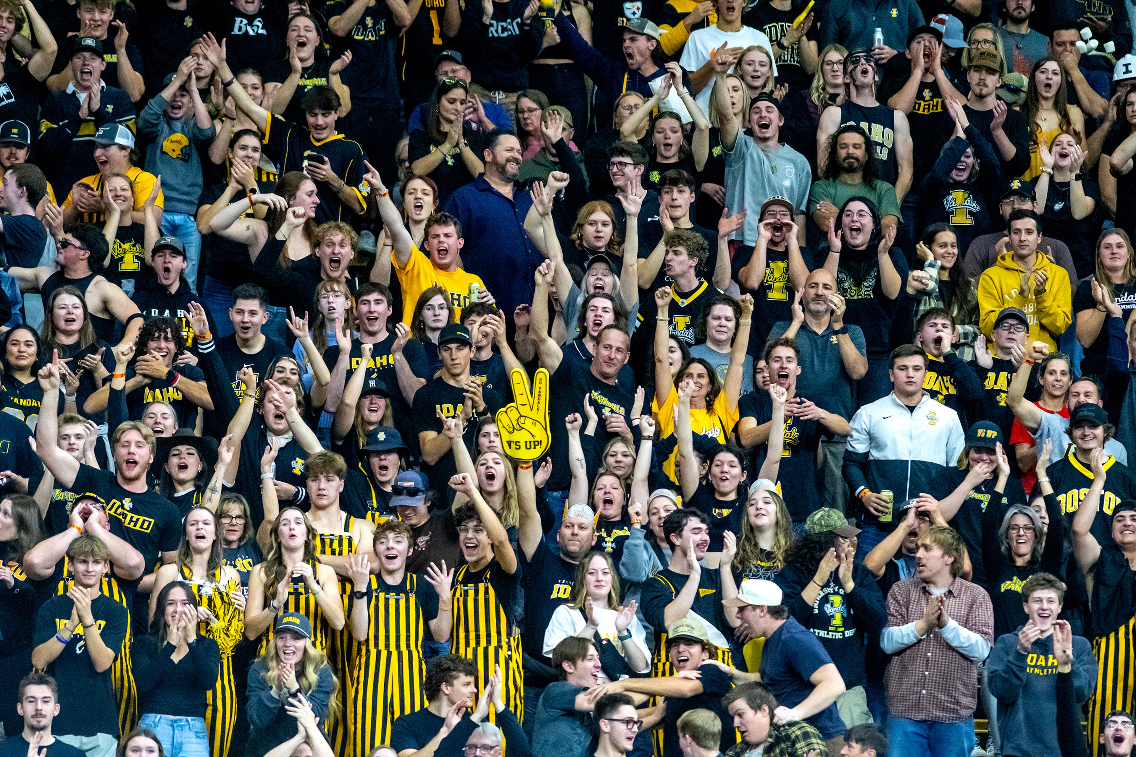 Idaho fans cheer on the Vandals against Eastern Washington during a Big Sky game Saturday at the Kibbie Dome in Moscow. 