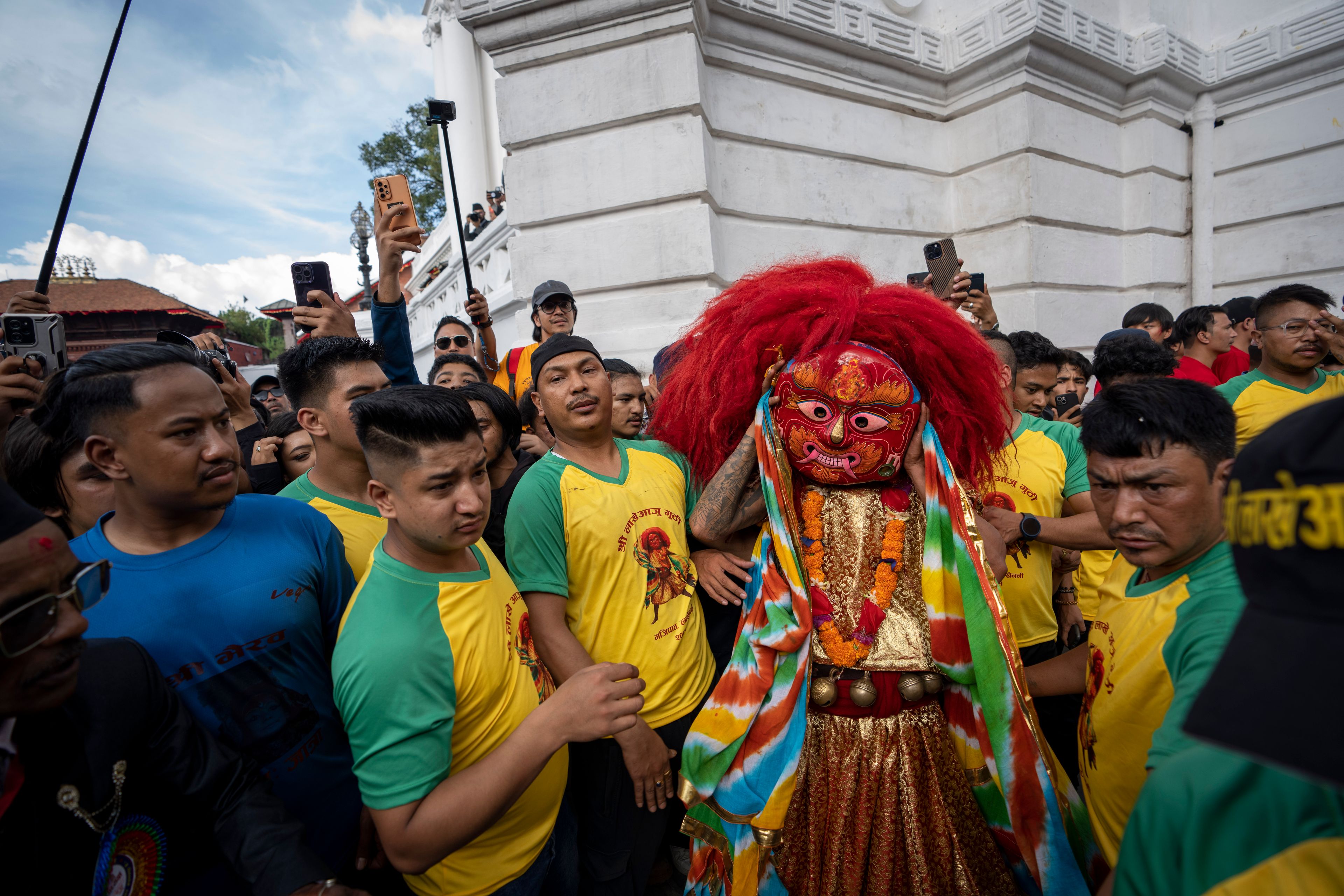 The Lakhe, a demon adored for divine might, performs during Indra Jatra, a festival that marks the end of the rainy season in Kathmandu, Nepal, Tuesday, Sept. 17, 2024. (AP Photo/Niranjan Shrestha)