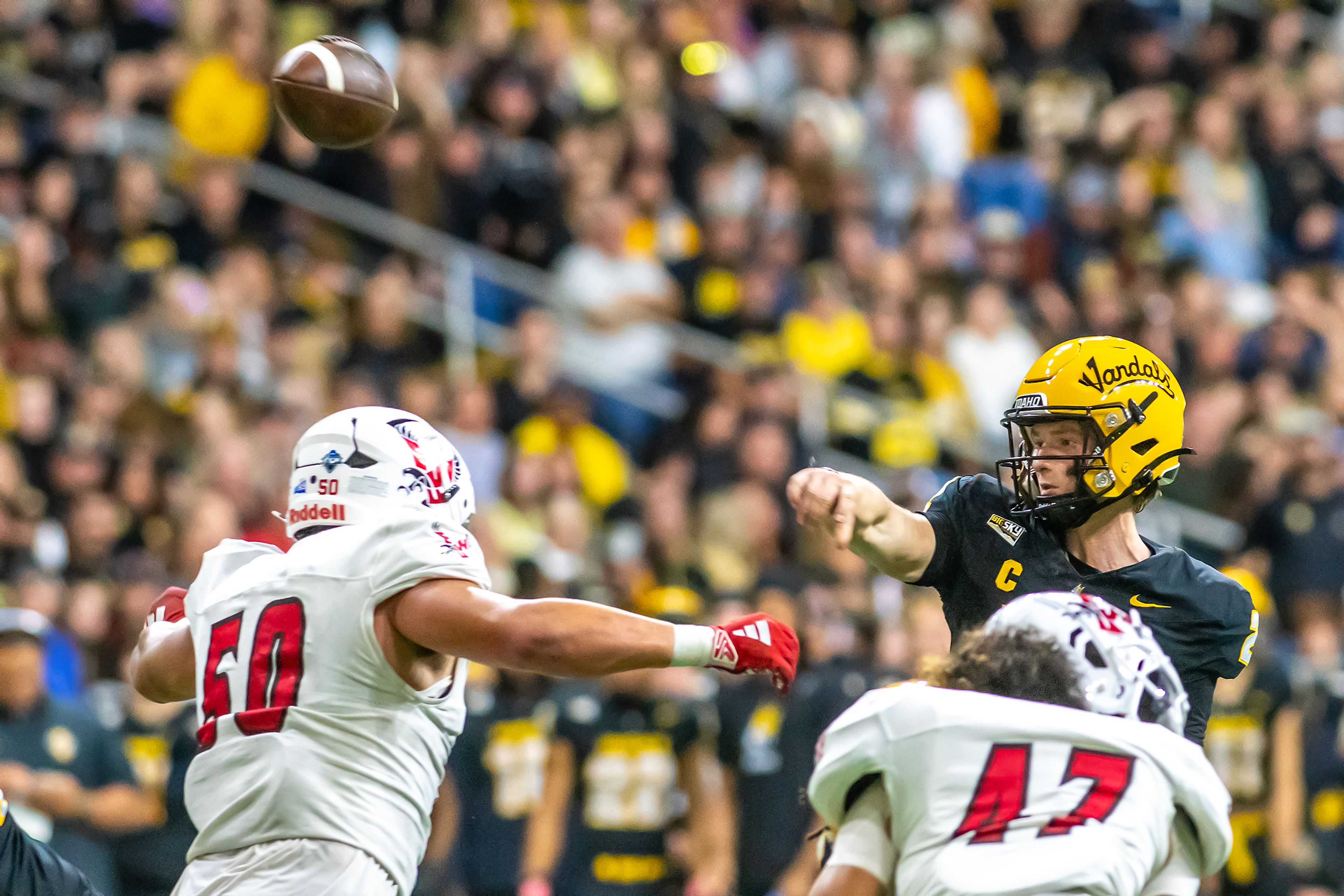 Idaho quarterback Jack Layne throws a touchdown pass against Eastern Washington during a Big Sky game Saturday at the Kibbie Dome in Moscow.