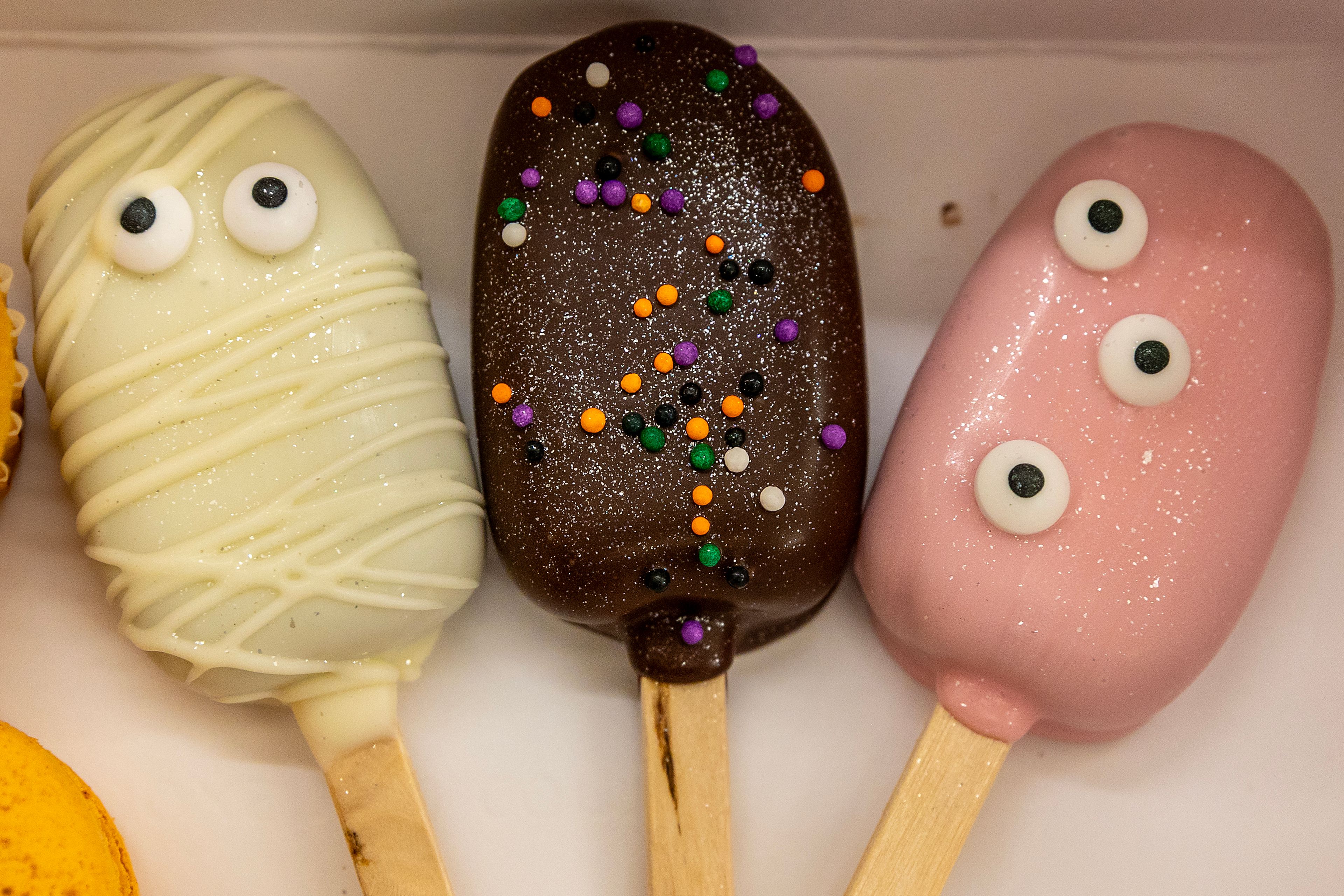 A box of Halloween-themed treats at b's bakery.
