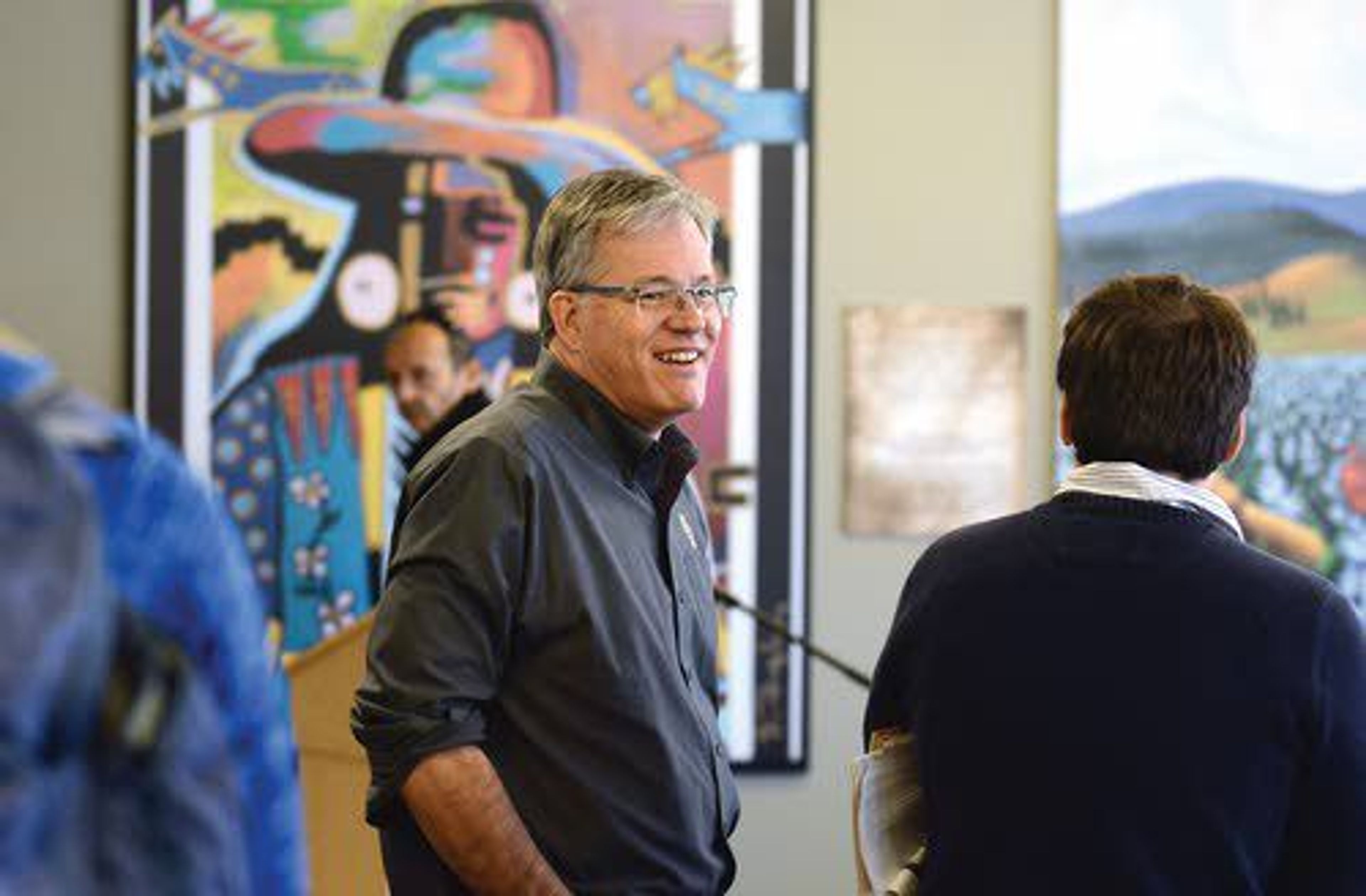 University of Idaho President Chuck Staben visits with attendees at the dedication Friday in the Pitman Center in Moscow.