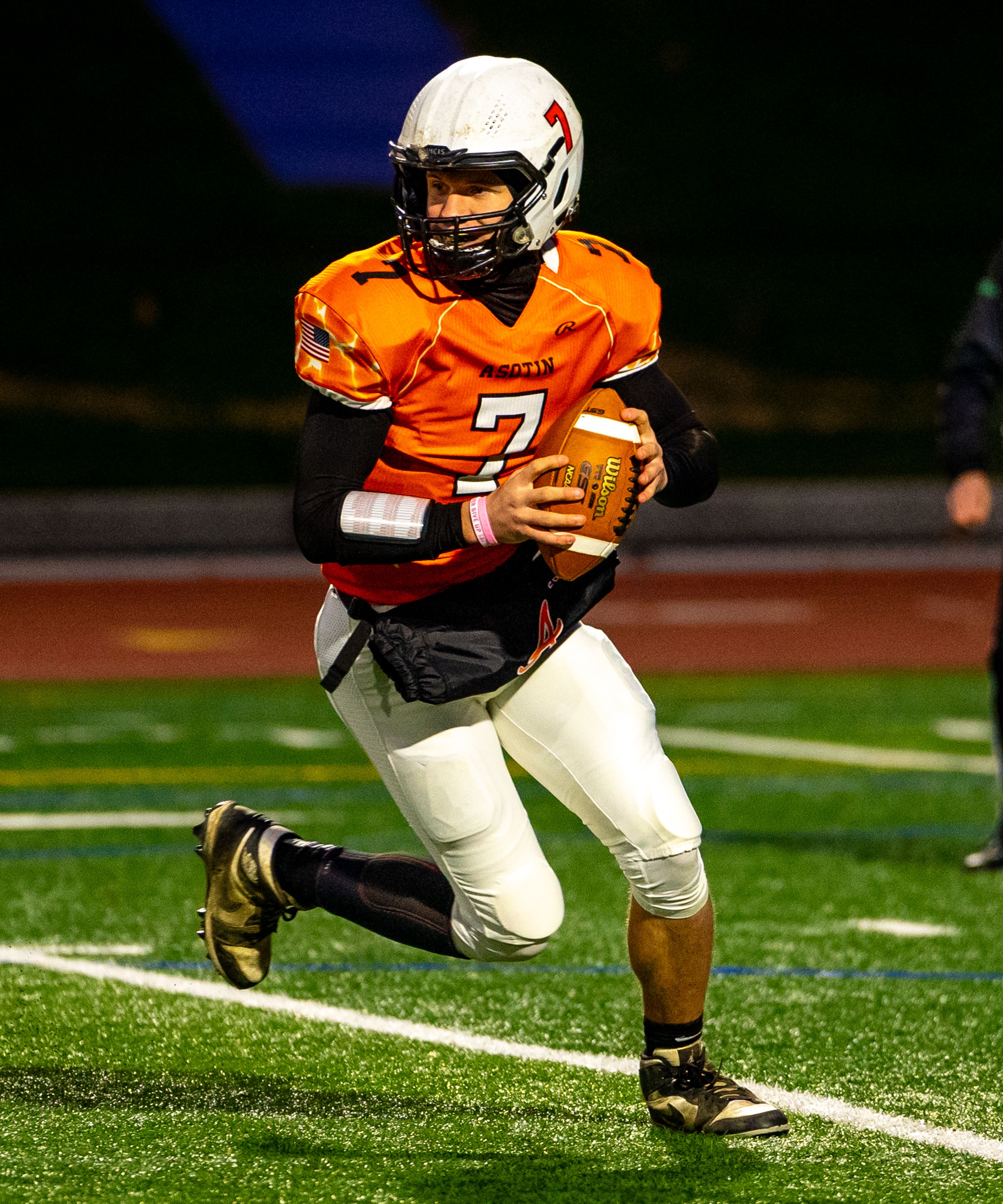 Asotin quarterback Cody Ells looks to pass during a semifinal game against Napavine in the Washington 2B state tournament Saturday in Richland.