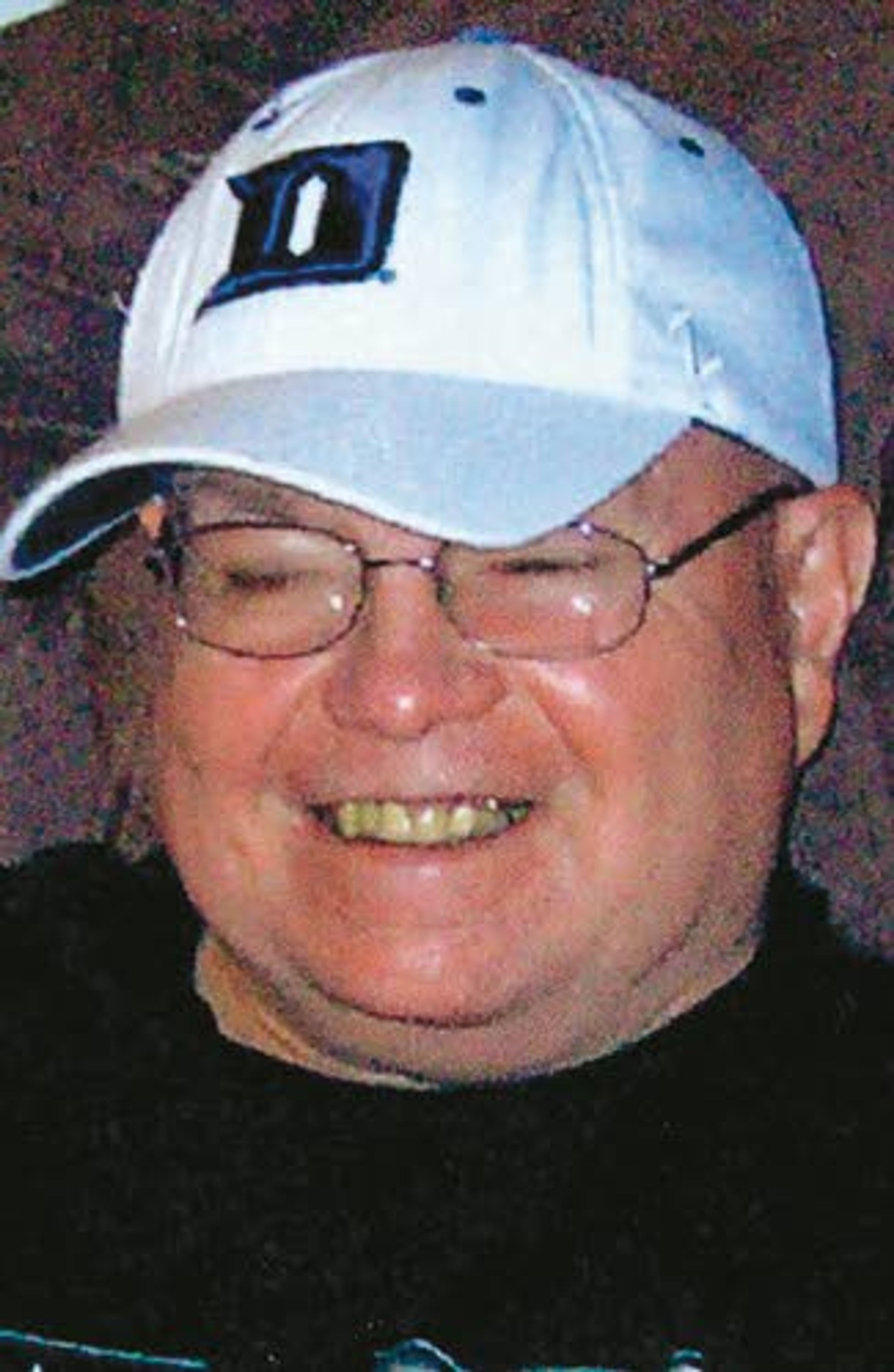 James L. Rhodes, 58, Lewiston