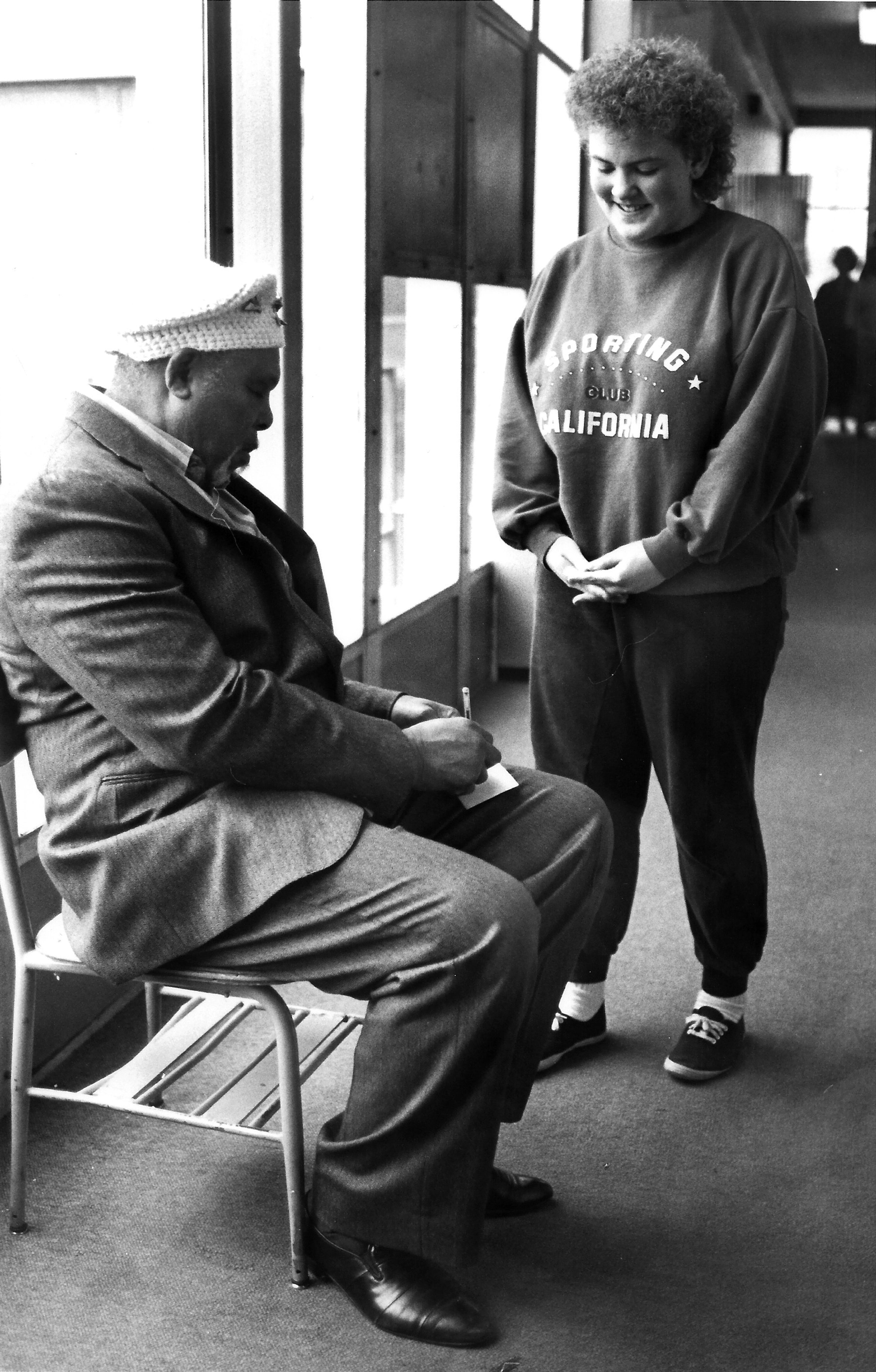 Famed professional boxer Archie Moore signs an autograph for Heidi Orup at Lapwai High School in this Barry Kough photo published in the April 25, 1991, Lewiston Tribune. Orup was an exchange student at LHS from Denmark and asked Moore to sign for her while he was visiting students at the school April 24. He had made several visits to north central Idaho in recent years, according to the photo caption. According to boxrec.com, Moore competed in the light heavyweight division from 1935-63 and had a total of 186 wins. He held the World Light Heavyweight Champion title from 1952-62. Moore died in 1998. Readers who would like to share their historical photos (20 years or older) from throughout the region may do so by emailing them to blasts@lmtribune.com or submitting them to: Blast from the Past, P.O. Box 957, Lewiston, ID 83501. Questions? Call Jeanne M. DePaul at (208) 848-2221.