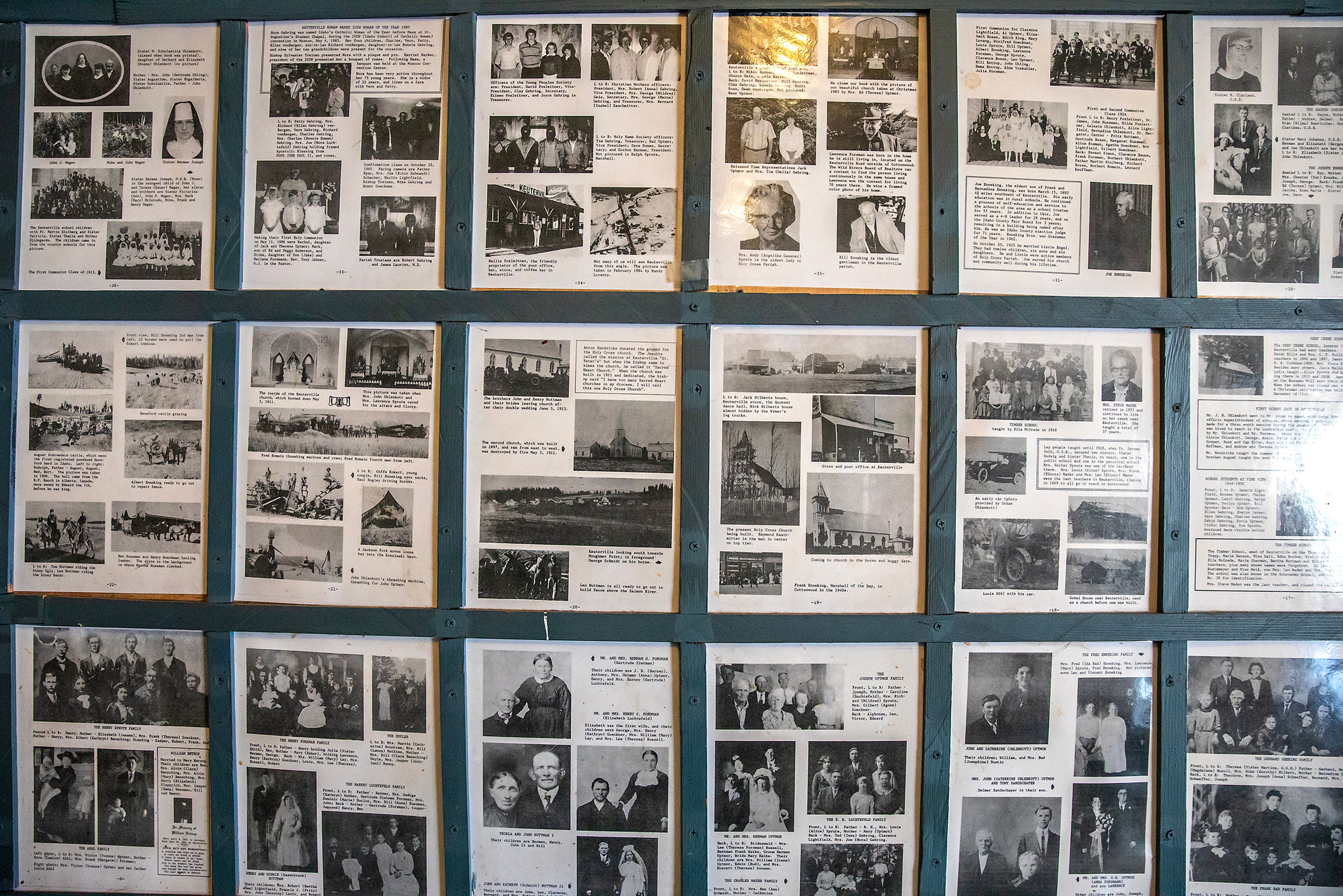 Historical pictures and documents line a wall Thursday at the Keuterville Pub & Grub.