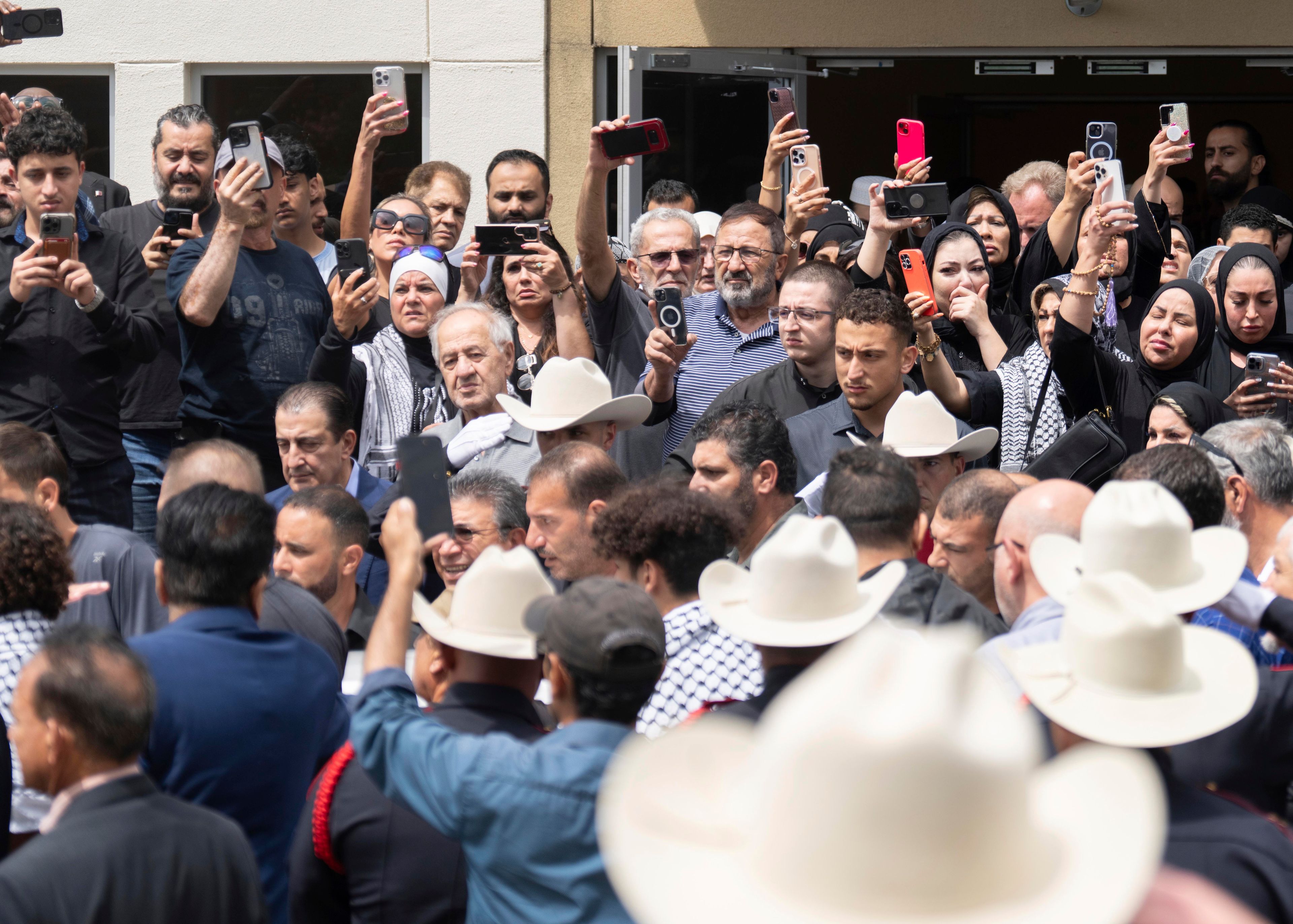 The casket of Harris County Precinct 4 Deputy Constable Maher Husseini leaves Masjid Al Salem Mosque after friends, family and law enforcement gathered for funeral prayers, Thursday, Sept. 5, 2024, in Spring, Texas.